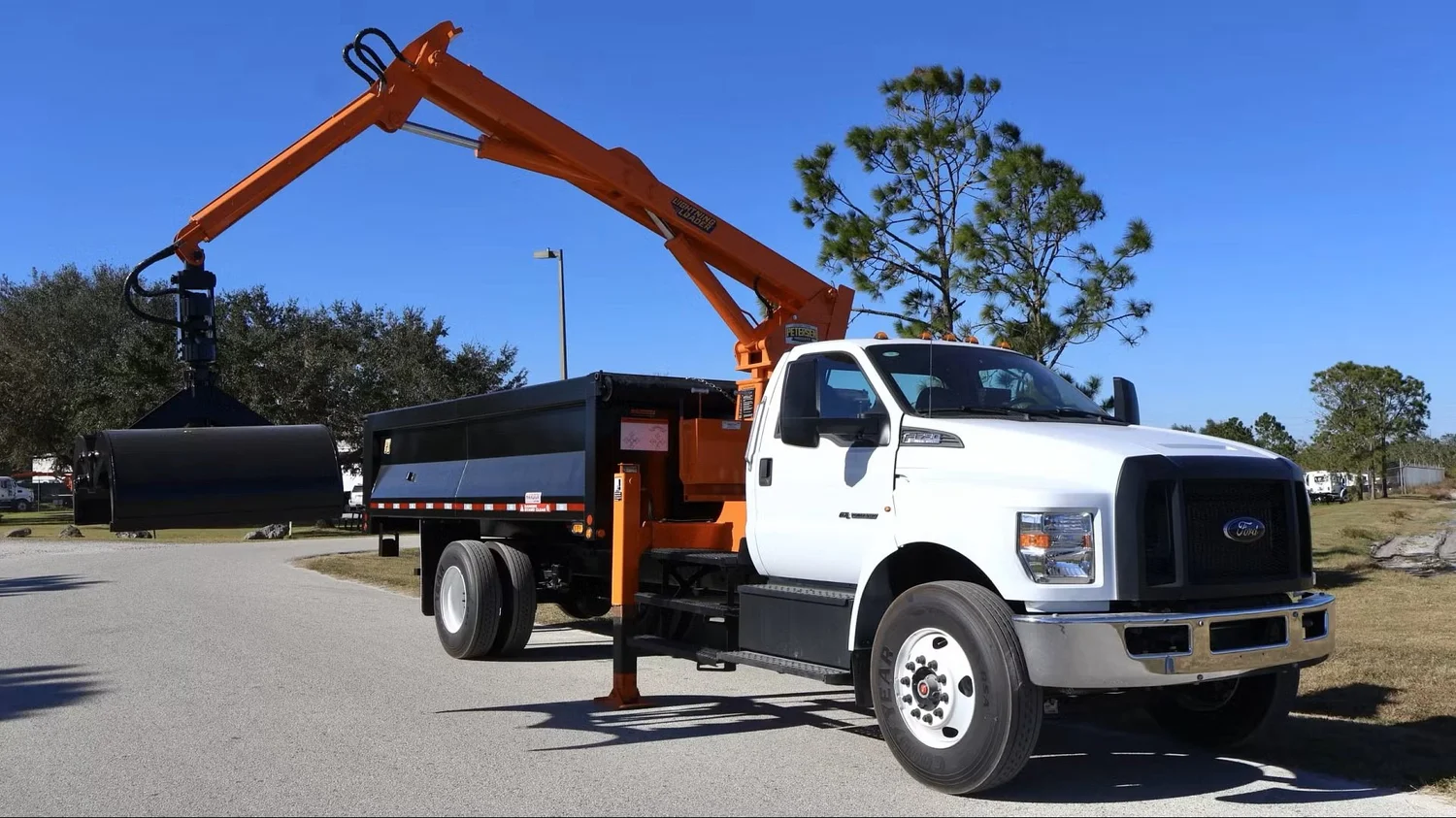 Petersen Grapple Loaders | TL3, TL2 Non-CDL & Container Transport ...