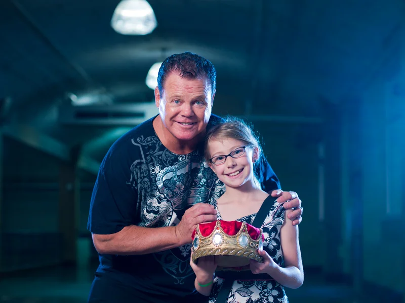 WWE's Jerry "The King" Lawler with fan.
