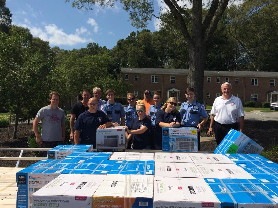 Assisting Plymouth's Chief Bradley and Selectman Tavares to install donated AC units for the elderly (8/2015)