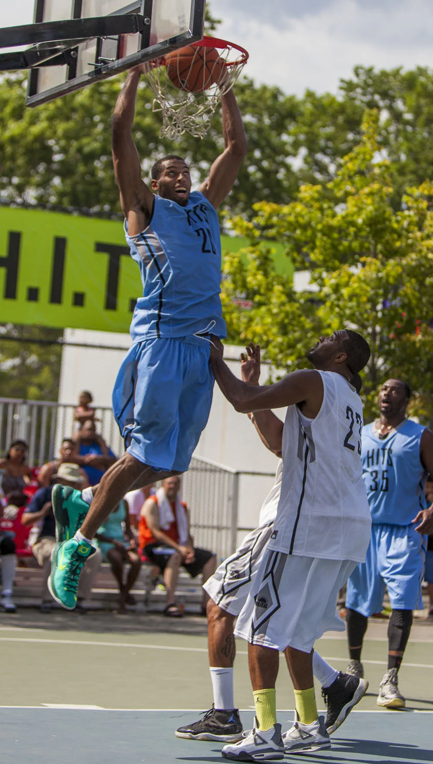 Quinton "T2" Hosley, who played for the storied 'Team Nike' last summer, rises for two of his 24 points for Skull Gang in a losing effort.
