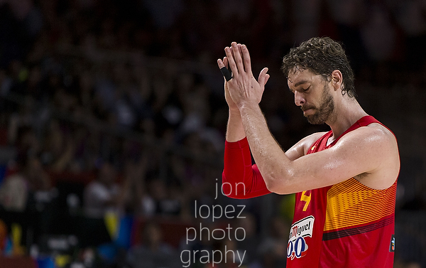 Spain's Pau Gasol cheers back at the roaring crowd as he exits the game for the last time in a defeat to France. 