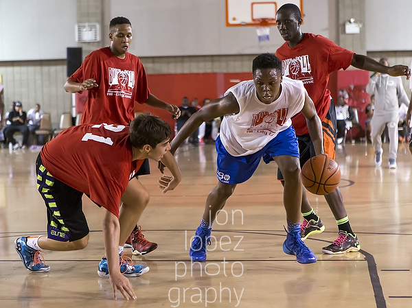 Cahiem Brown puts a debilitating move on the defense at the 2014 Books & Ball All-City game in the Bronx, NY. 