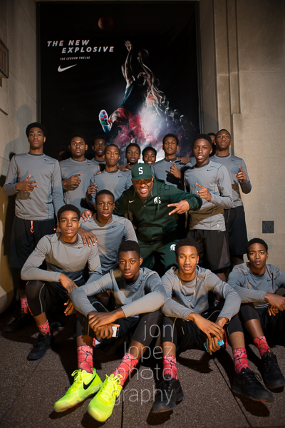 The world's top-ranking motivational speaker, Eric Thomas, poses with the two teams on the eve of the IS 8 championship game. 
