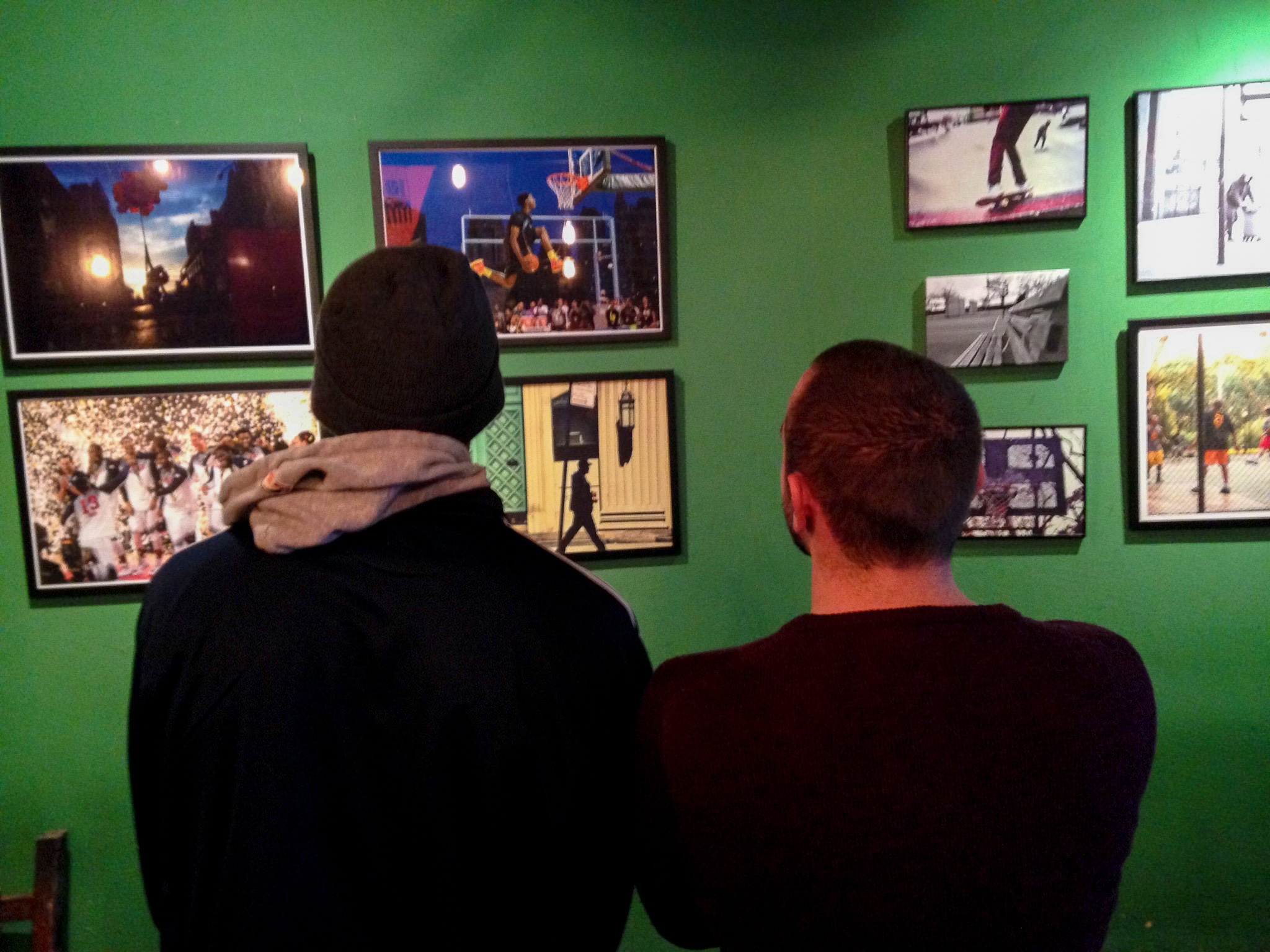 Alex and I going over the layout of our photos just before the opening of the Respect The Shooter and Exhibit A photography exhibitions at Camaradas. iPhone photo by Alexa Ramos, my marvelous fiancée. 