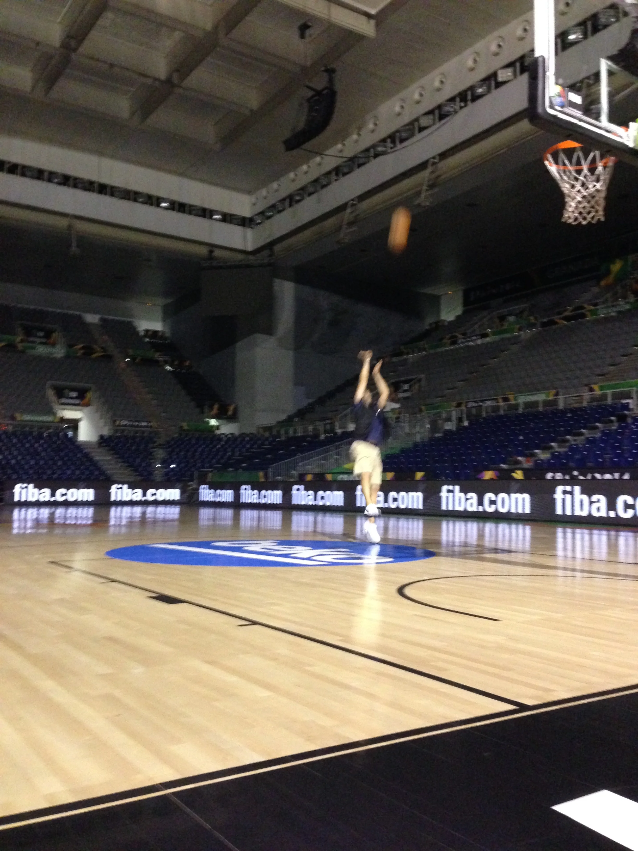I couldn't resist the urge to create my shots from the court while I was in Spain. Unlike my cell phone photo documenting the moment, my shot was pure! And, this was after a long day of shooting, so the lights were out in the arena. It made for a perfect situation to take in the experience. 