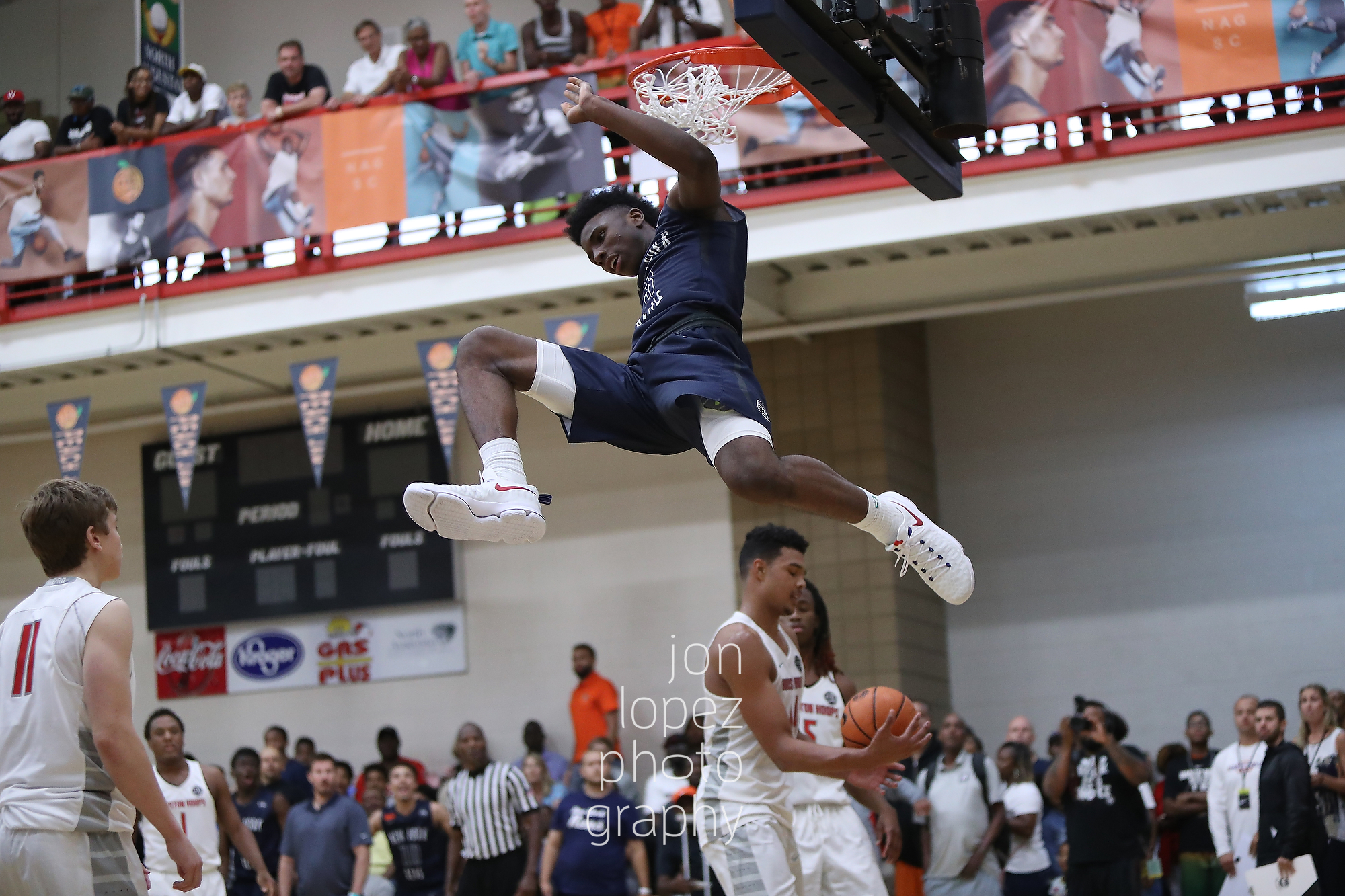 New York Rens standout guard and Queens, NY native Hamidou Diallo may have been the most exciting player to watch in the EYBL in 2016. Here he double pumped to avoid a block, absorbed contact, and still threw it down much to the delight of his teammates and the crowd.
