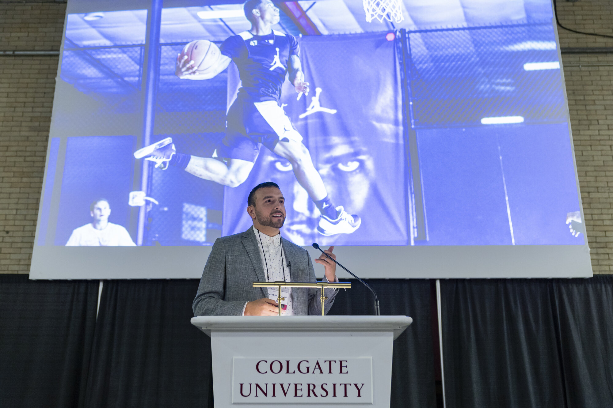  Jon Lopez '06, freelance sports photographer and cinematographer is the keynote speaker during SophoMORE Connections in the Huntington Gymnasium Jaunary 17, 2020. 