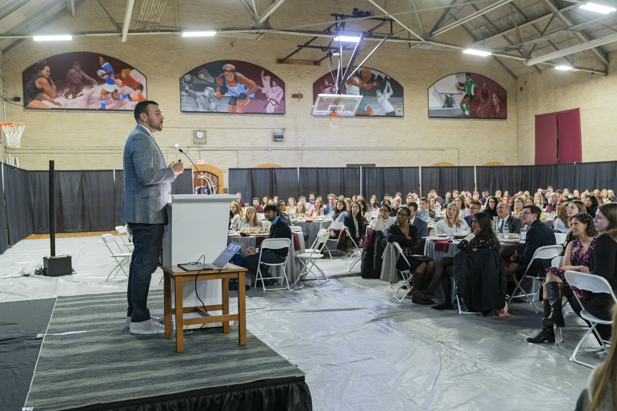  Jon Lopez '06, freelance sports photographer and cinematographer is the keynote speaker during SophoMORE Connections in the Huntington Gymnasium Jaunary 17, 2020. 