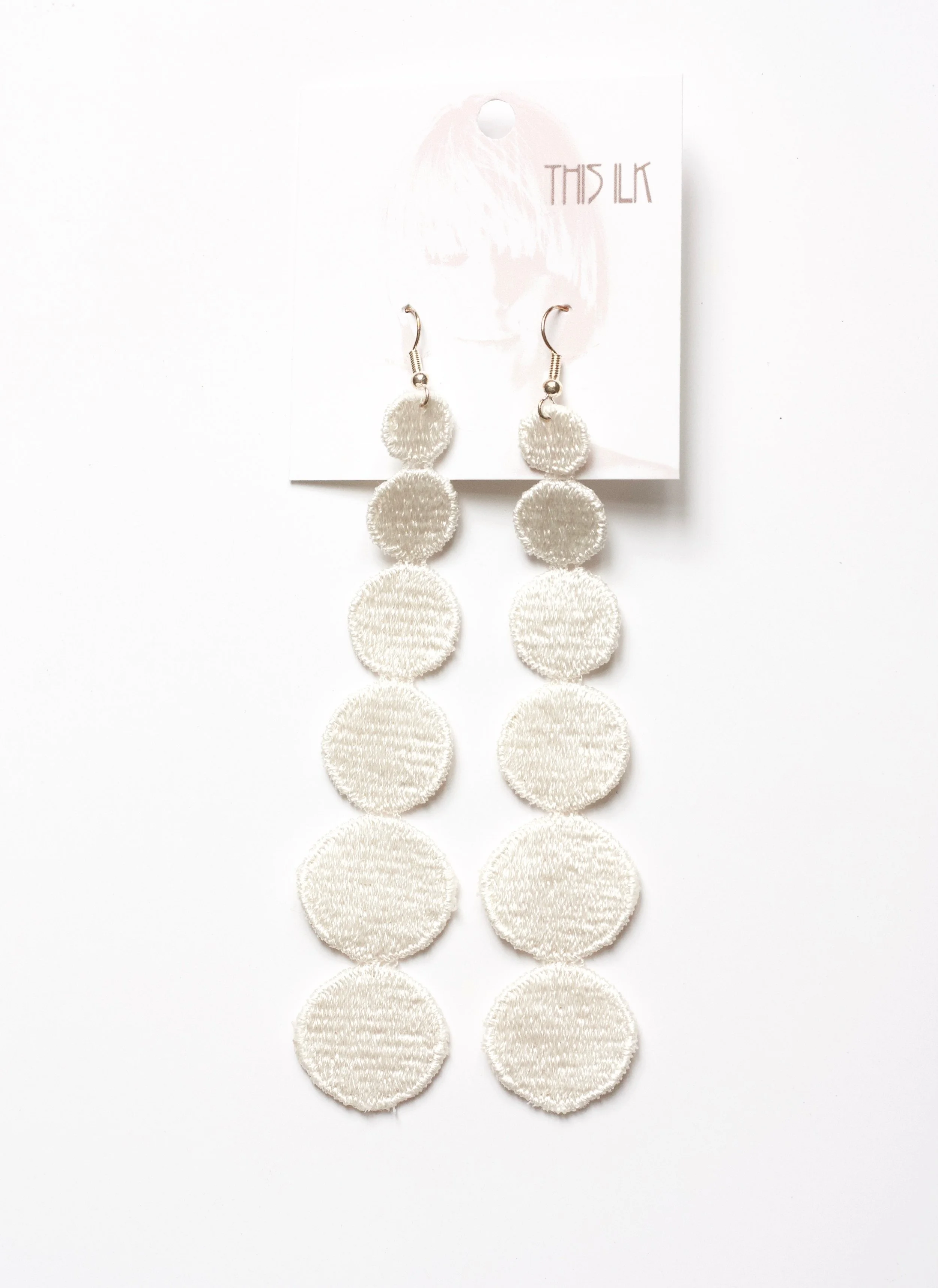 Dots white on tag.jpg