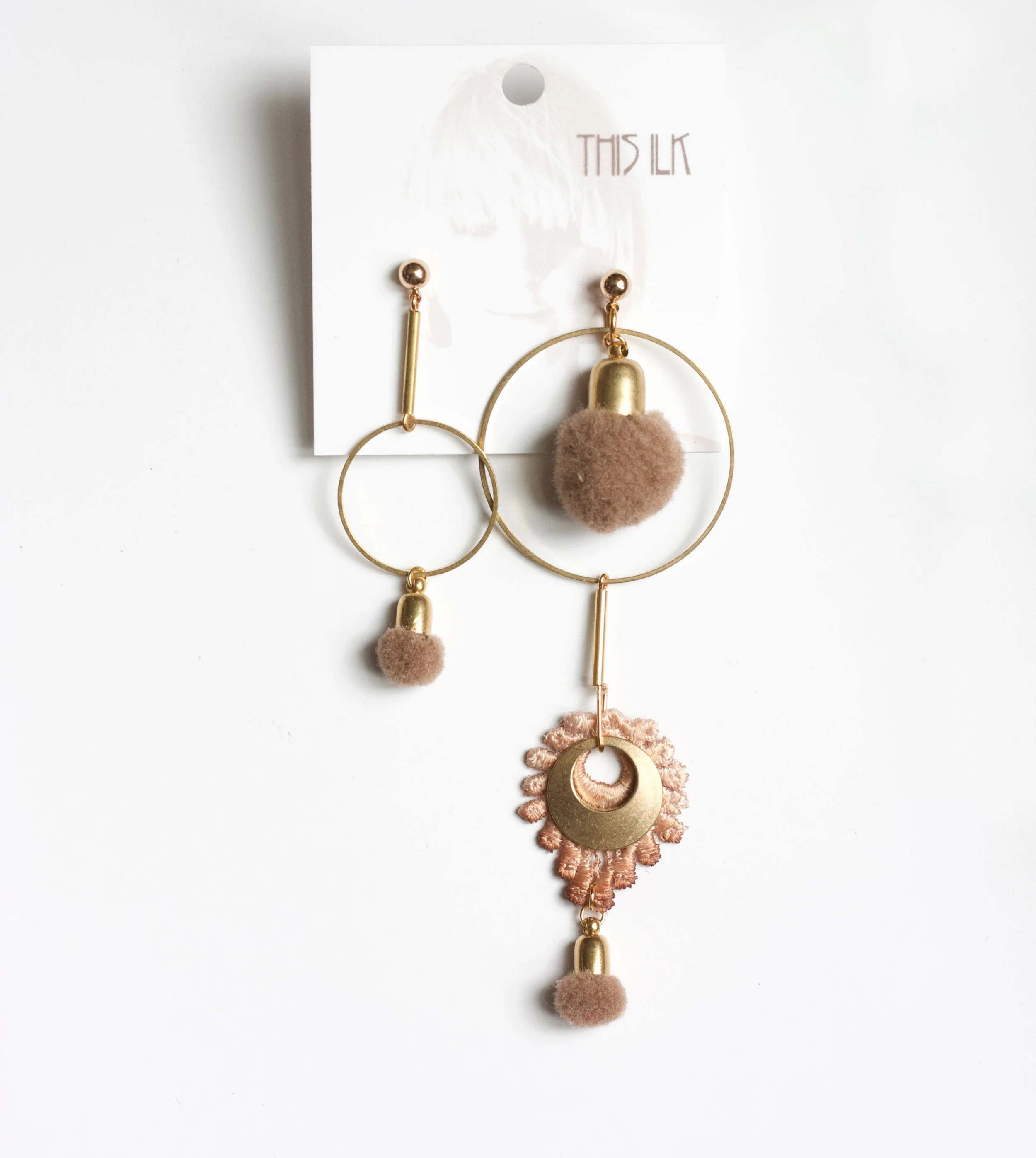 Artillery earrings beige.jpg