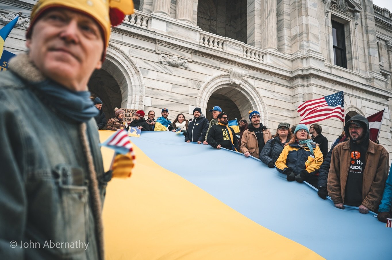 3 floor of people at a Ukraine protest at Minnesota State. #slavaukraini @standwithukrainemn @ukraine.ua @leica_boutique_ukraine