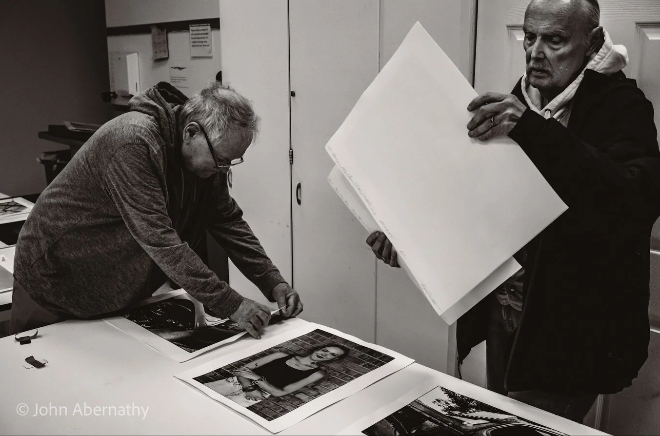 Tom Arndt setting up his work for a talk at The Ongoing Moment. @ott5197 #bnw_photography #bnwlovers #bnwstreetphotography #reedit
