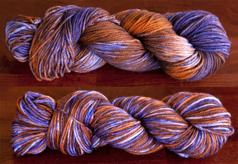 On the natural yarn, you can clearly see the pools of color. I think this is just as pretty as the skein below, but the reskeined yarn gives us a lot more information about what the final garment will look like.