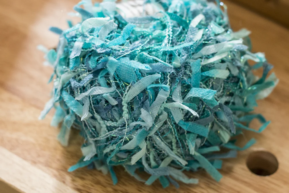 An example of a novelty yarn in which the stitches would easily get lost