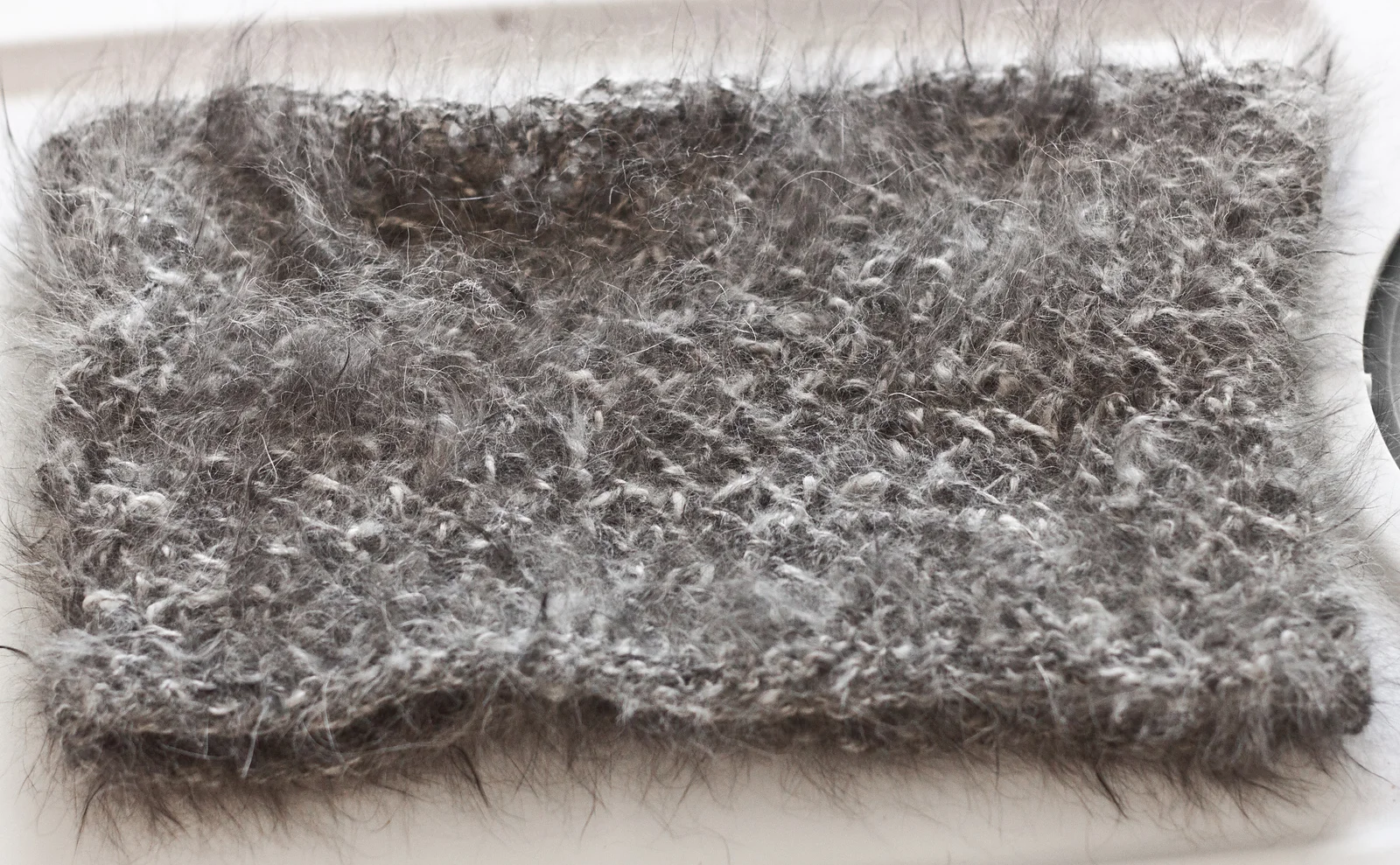 A cowl made out of fluffy handspun angora rabbit