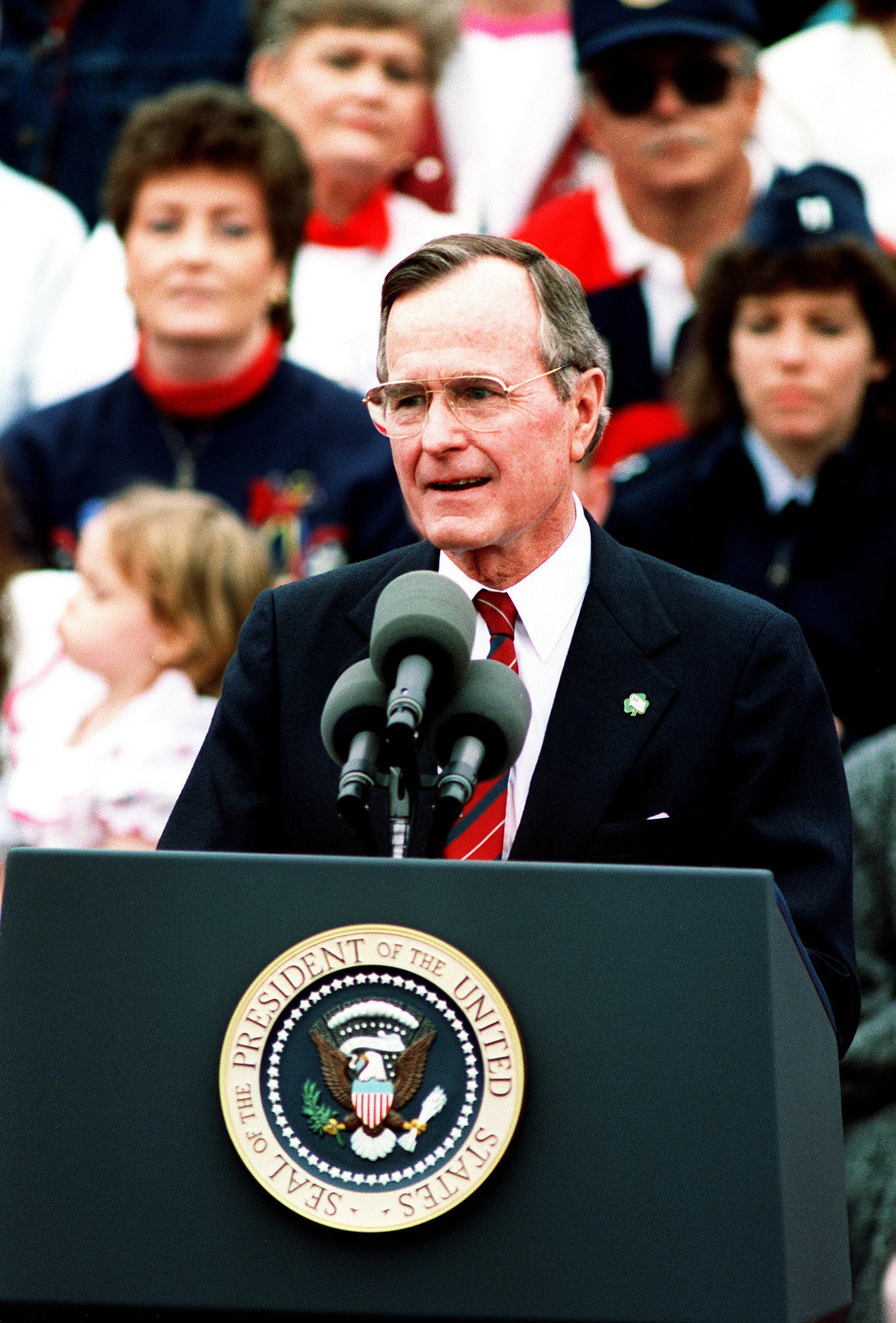 President George H.W. Bush speaks during a welcoming ceremony for U.S. military personnel just returned from deployment in Saudi Arabia during Operation Desert Storm at Sumter, S.C., March 24, 1991. (Photo by N. Miller)