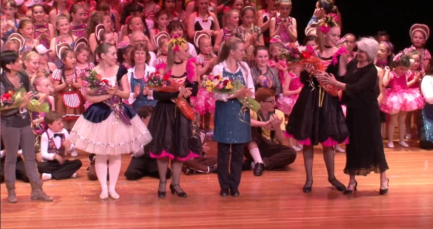 Finally presenting flowers to teachers and volunteers