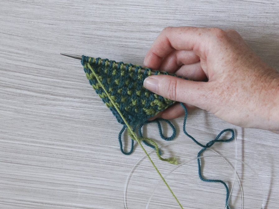 End of the row after slipping 3 with yarn in front