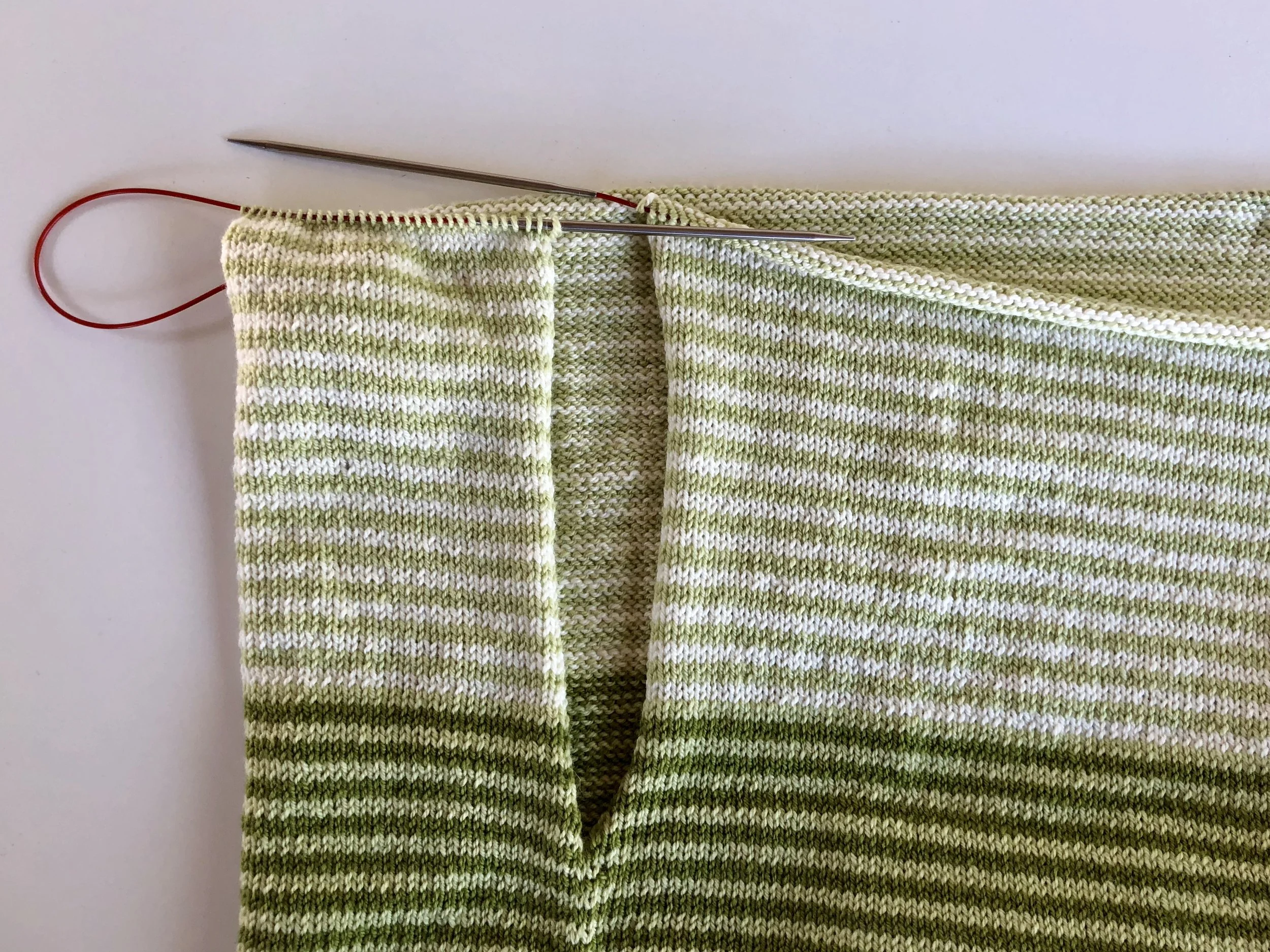 Front and back complete, divided for armhole