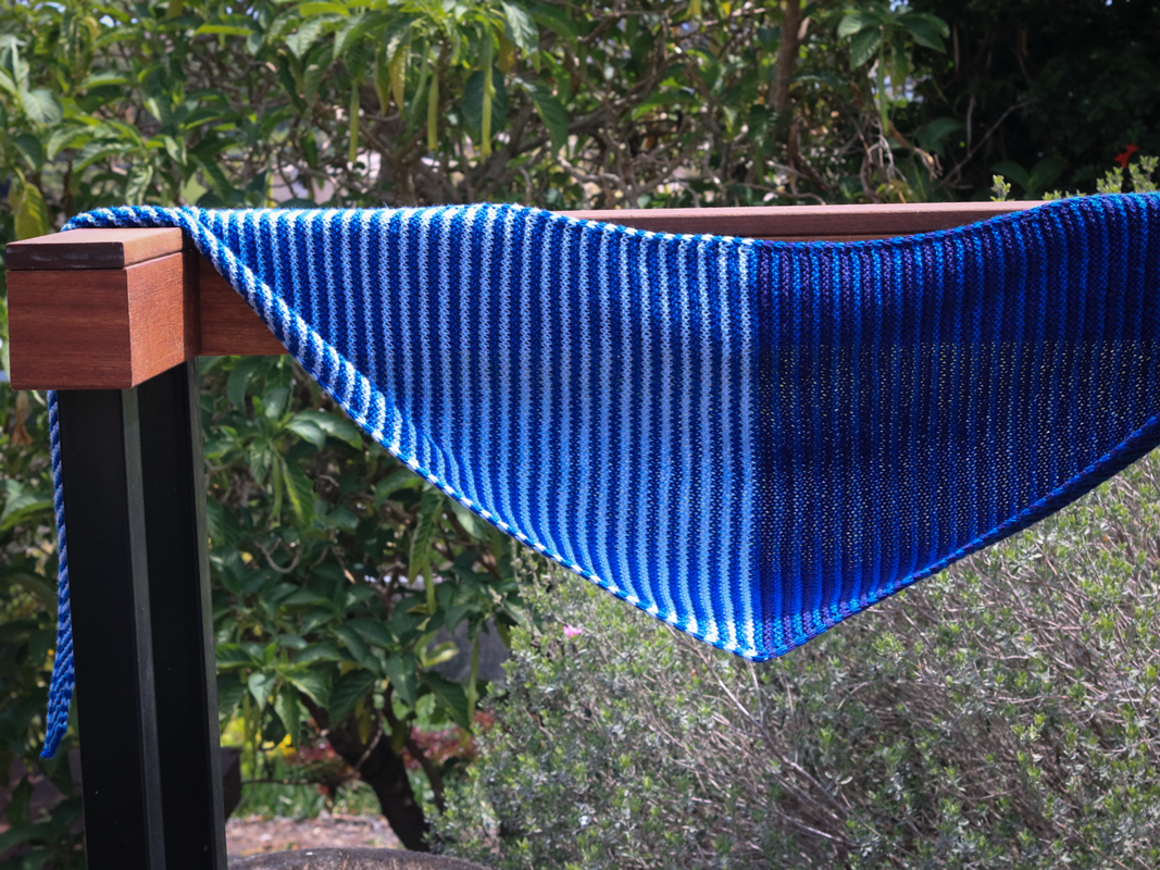 Something About Phoenix shawl knitting pattern with blue tones