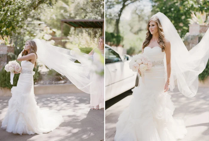 Lauren's flowing gown floats out behind her as she poses for a pre-wedding photoshoot; photo by Sylvie Gil
