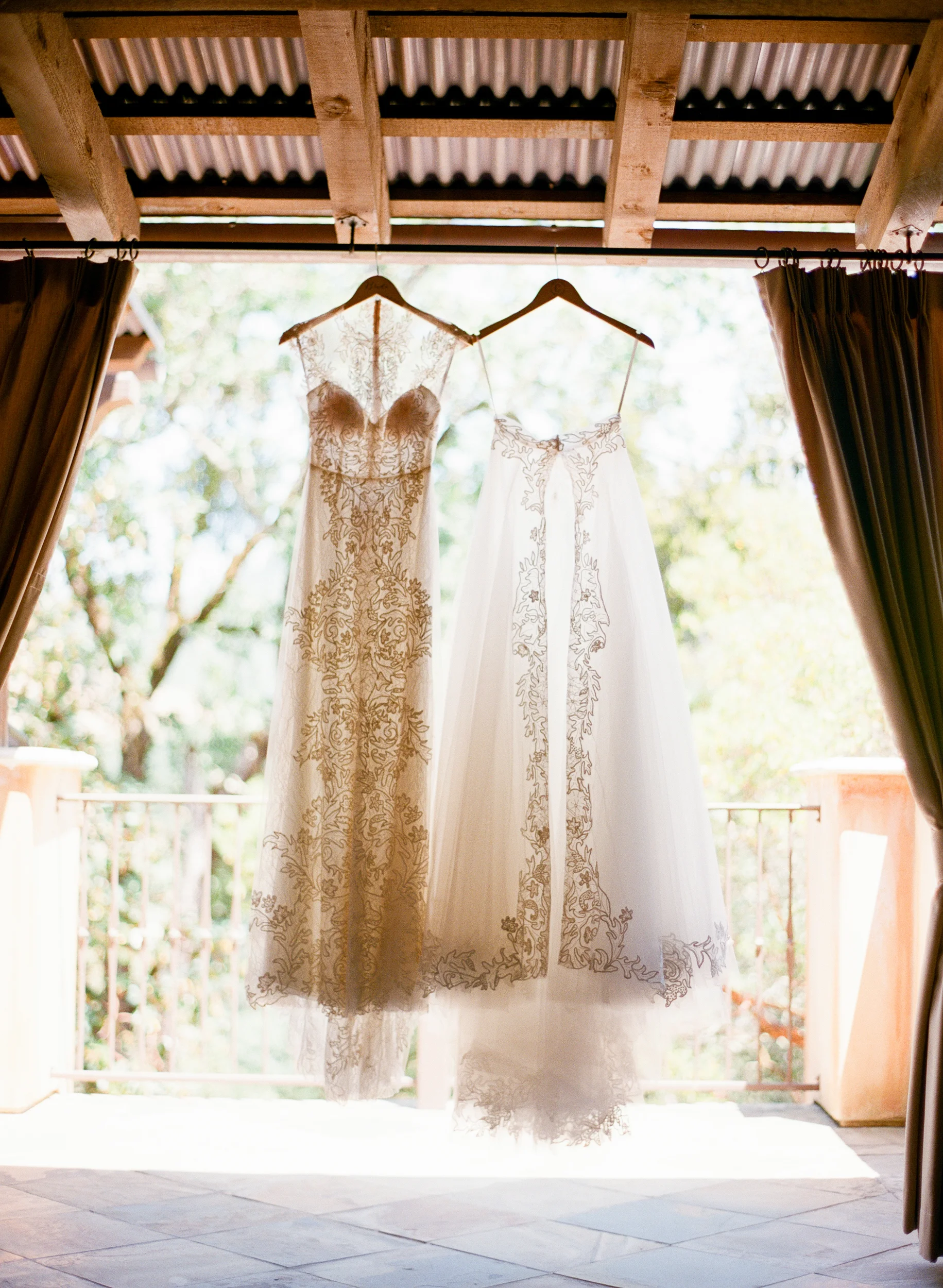 Two piece Monique Lhuillier gown on hangers