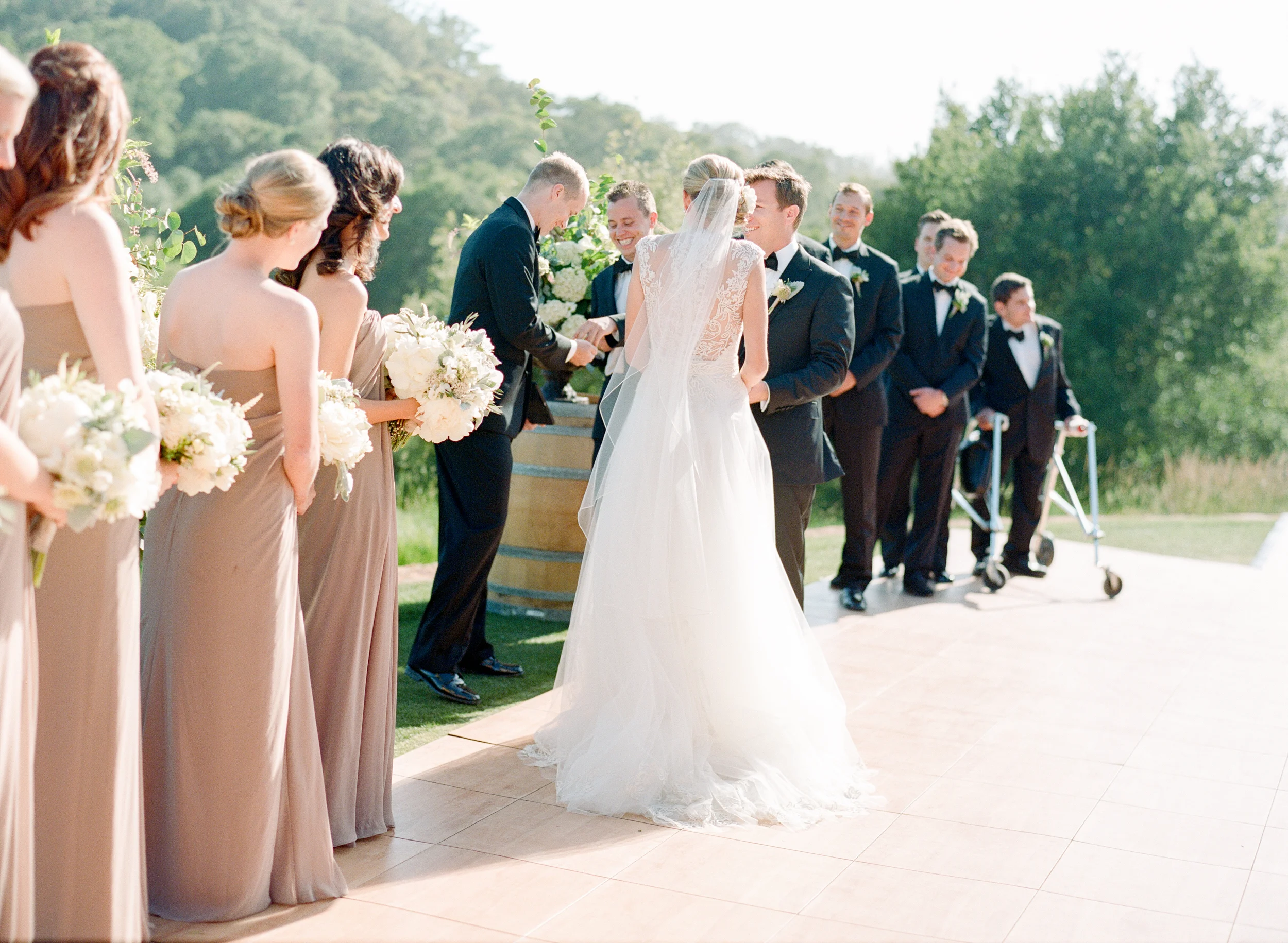 Bride and groom exchanging rings during Calistoga Ranch ceremony; Sylvie Gil Photography