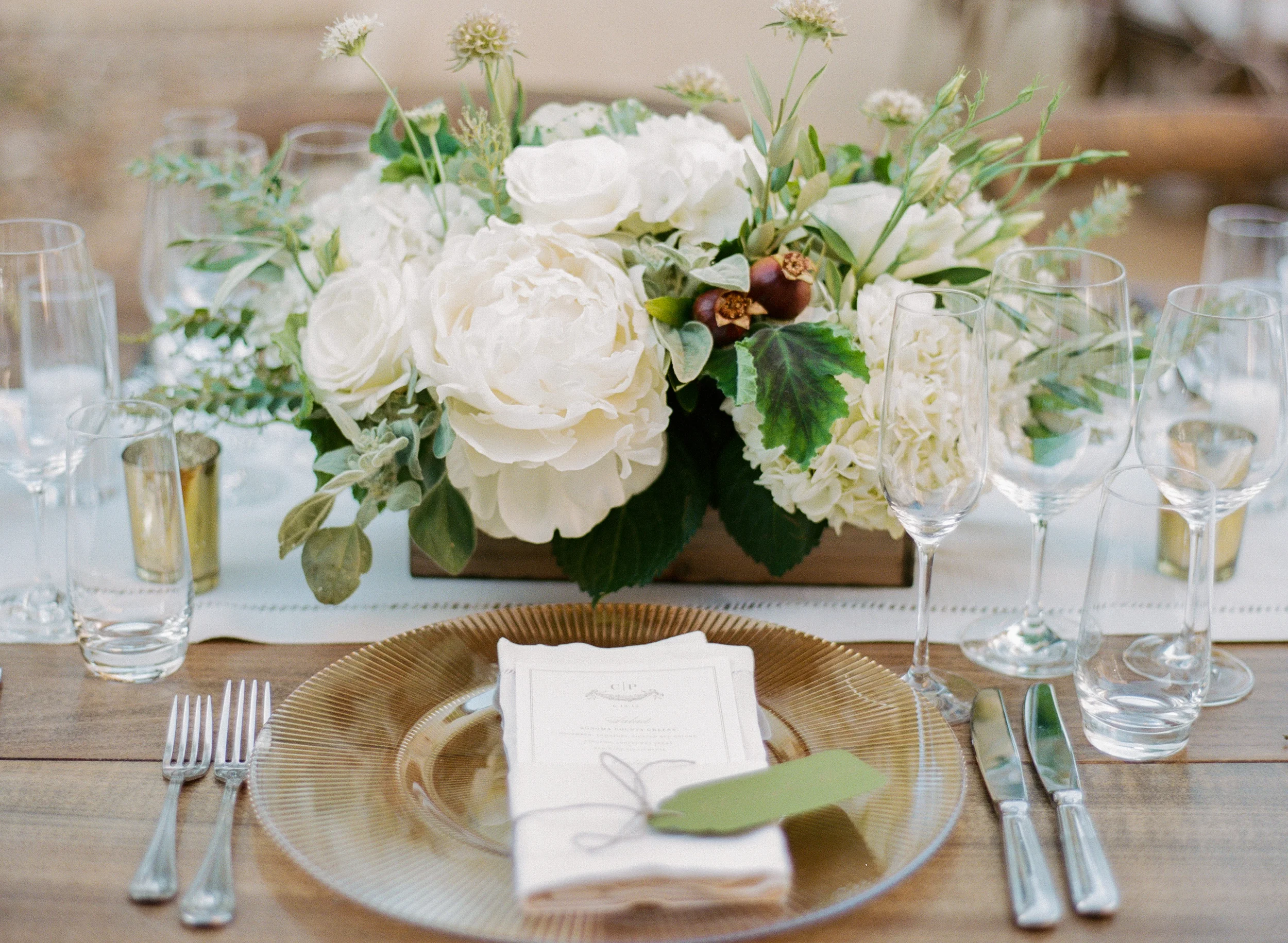 White and green peony box centerpiece at outdoor reception in Calistoga Ranch; Sylvie Gil Photography