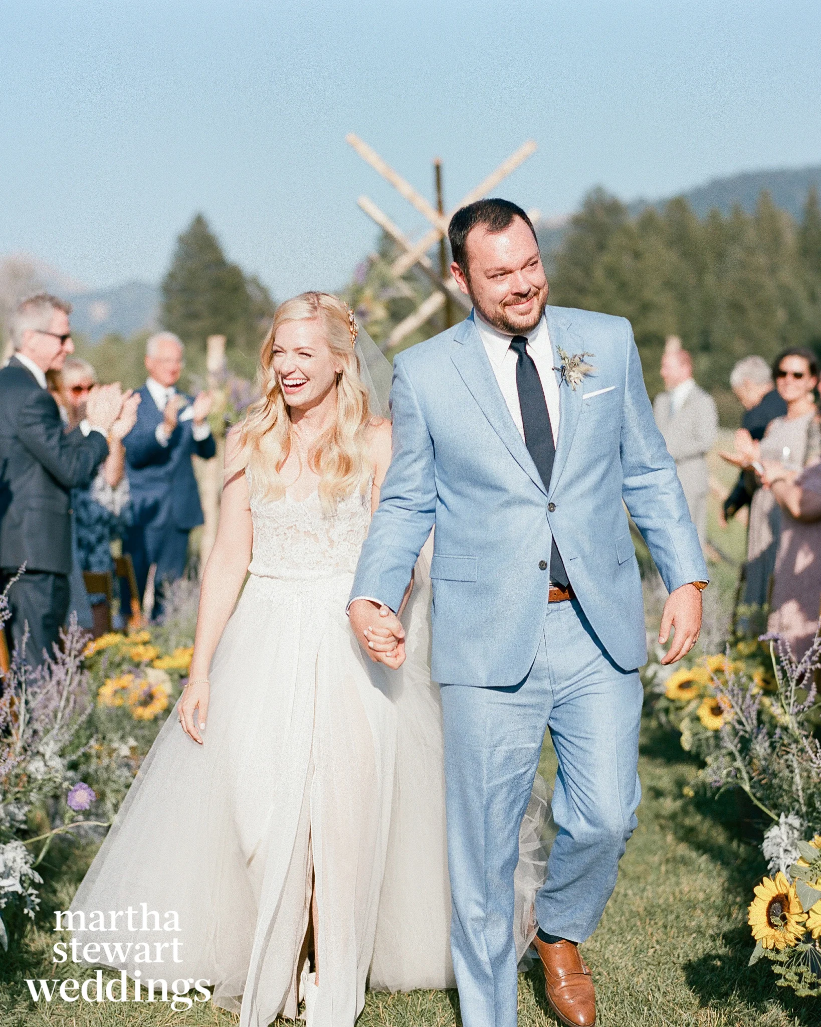 Emotional couple just married, leaving the altar in wyoming country wedding, Sylvie Gil Photography