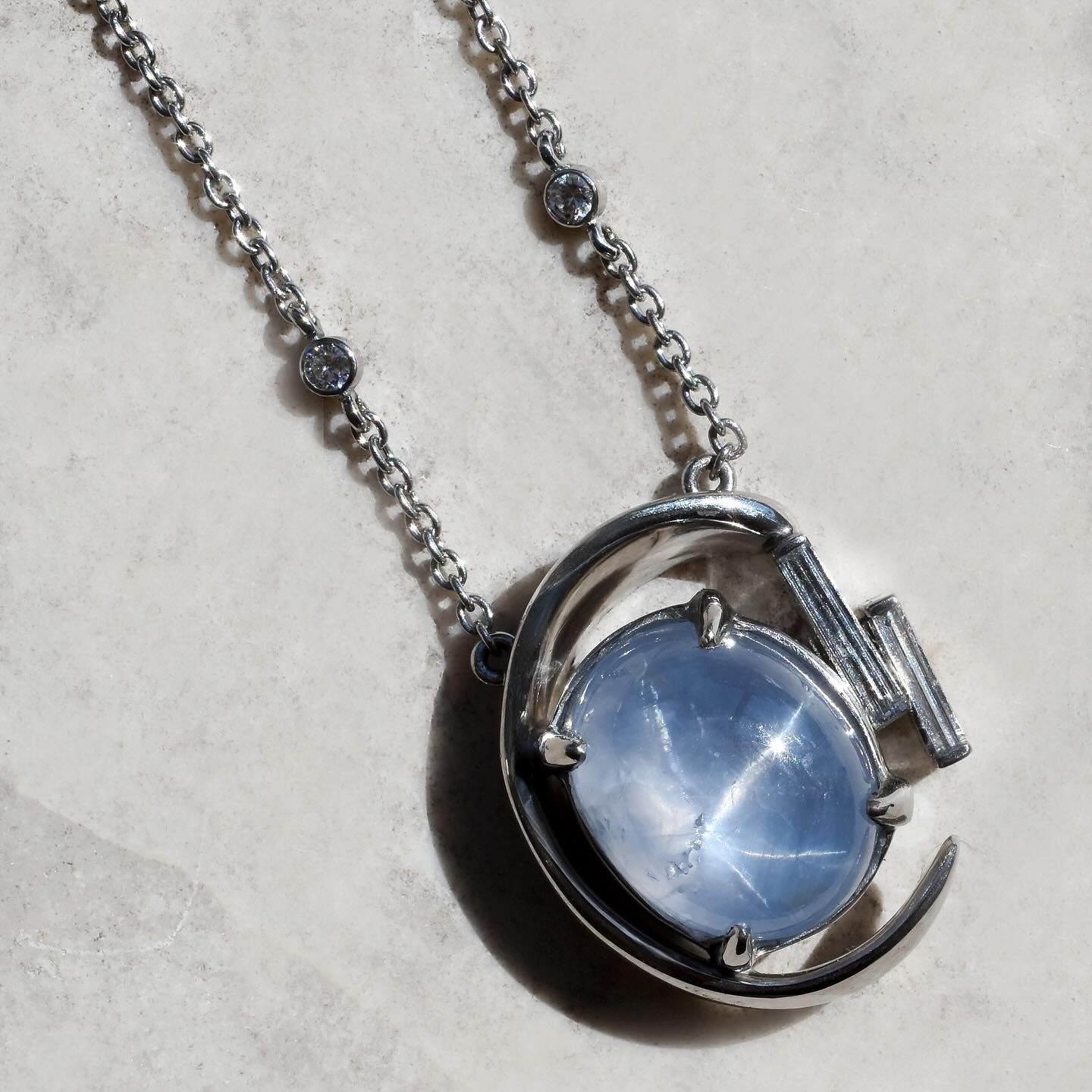 a custom star sapphire with baguette diamonds on a platinum diamonds by the yard chain 💫
