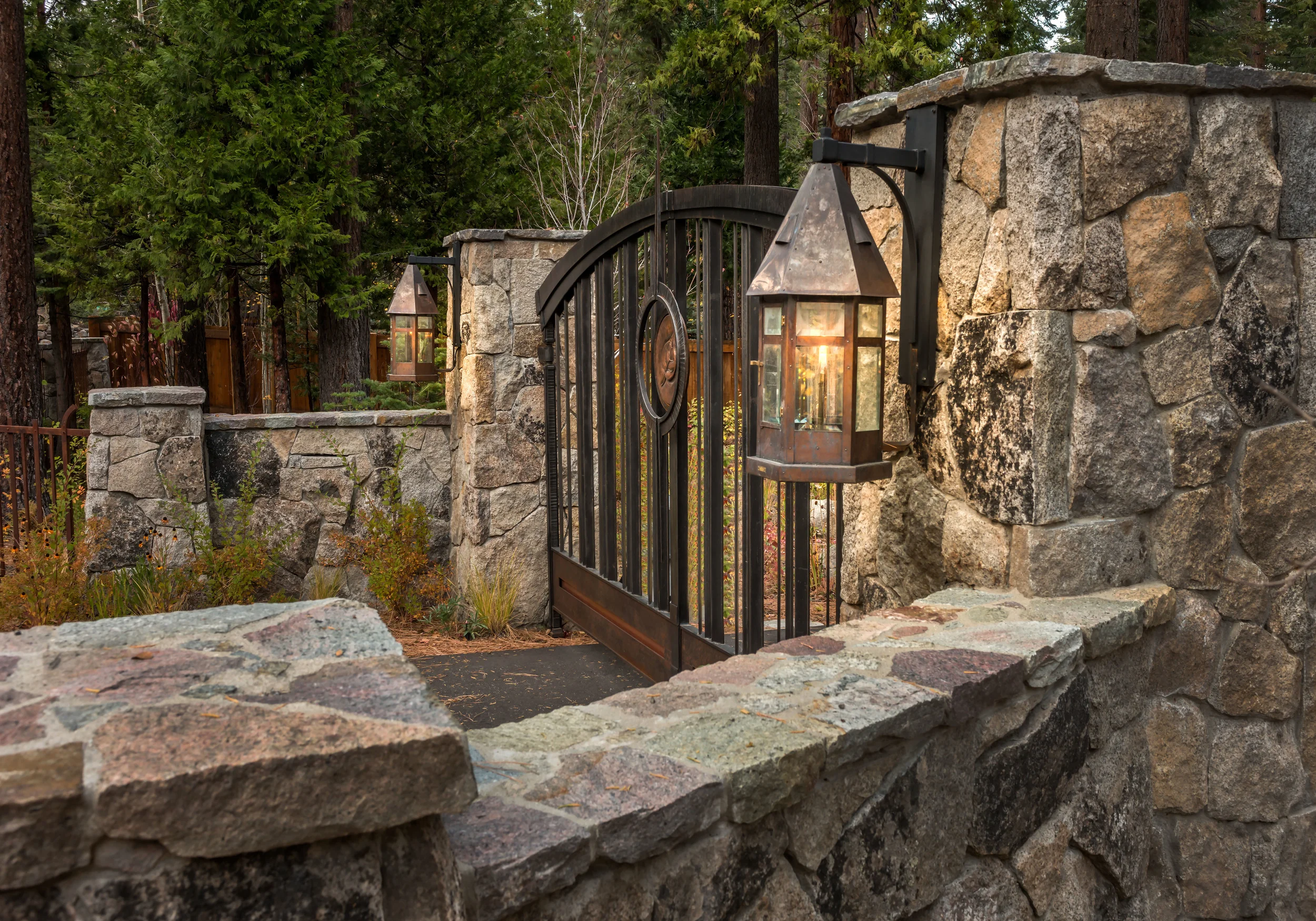 Contractor: Jim Morrison Construction Photography: Vance Fox Square Footage: 4,345 sf Features: Inglenook, Exhibition Wine Room, Turret Staircase, Natural Creek with Bridge, Lake Front Terrace + Firepit bedrooms: 4 bathrooms: 4.5