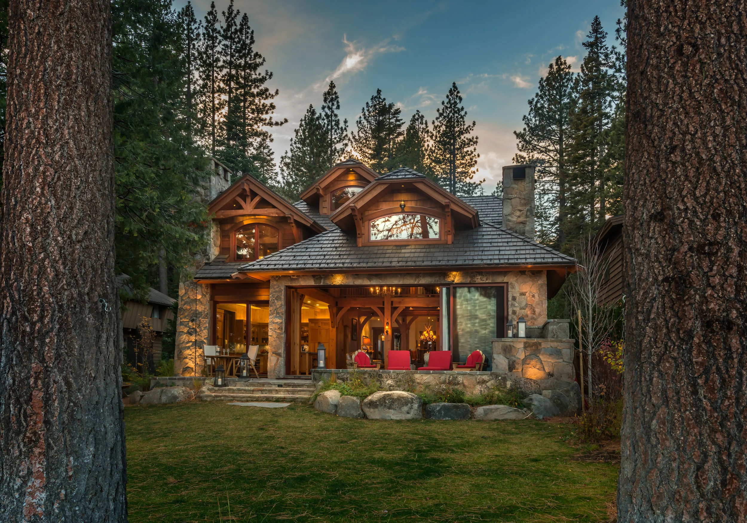 Contractor: Jim Morrison Construction Photography: Vance Fox Square Footage: 4,345 sf Features: Inglenook, Exhibition Wine Room, Turret Staircase, Natural Creek with Bridge, Lake Front Terrace + Firepit bedrooms: 4 bathrooms: 4.5