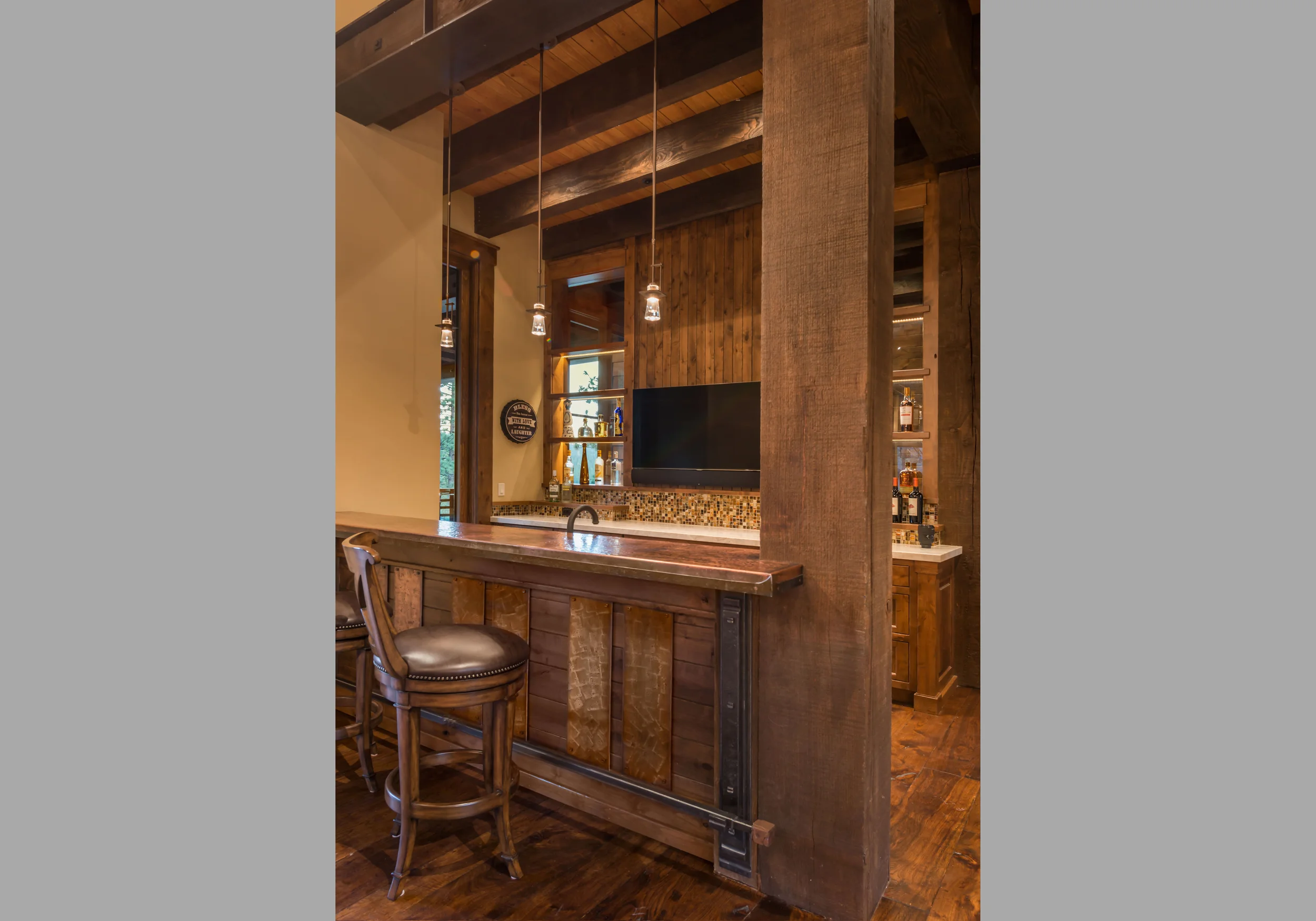 Contractor: Jim Morrison Construction Interior Finishes: WaltonAE Photography: Vance Fox Square Footage: 6,635 sf Features: Covered Outdoor Dining, Game Room, Built-In-Bar, Wine Cellar, Outdoor Shower bedrooms: 5 bathrooms: 5.5