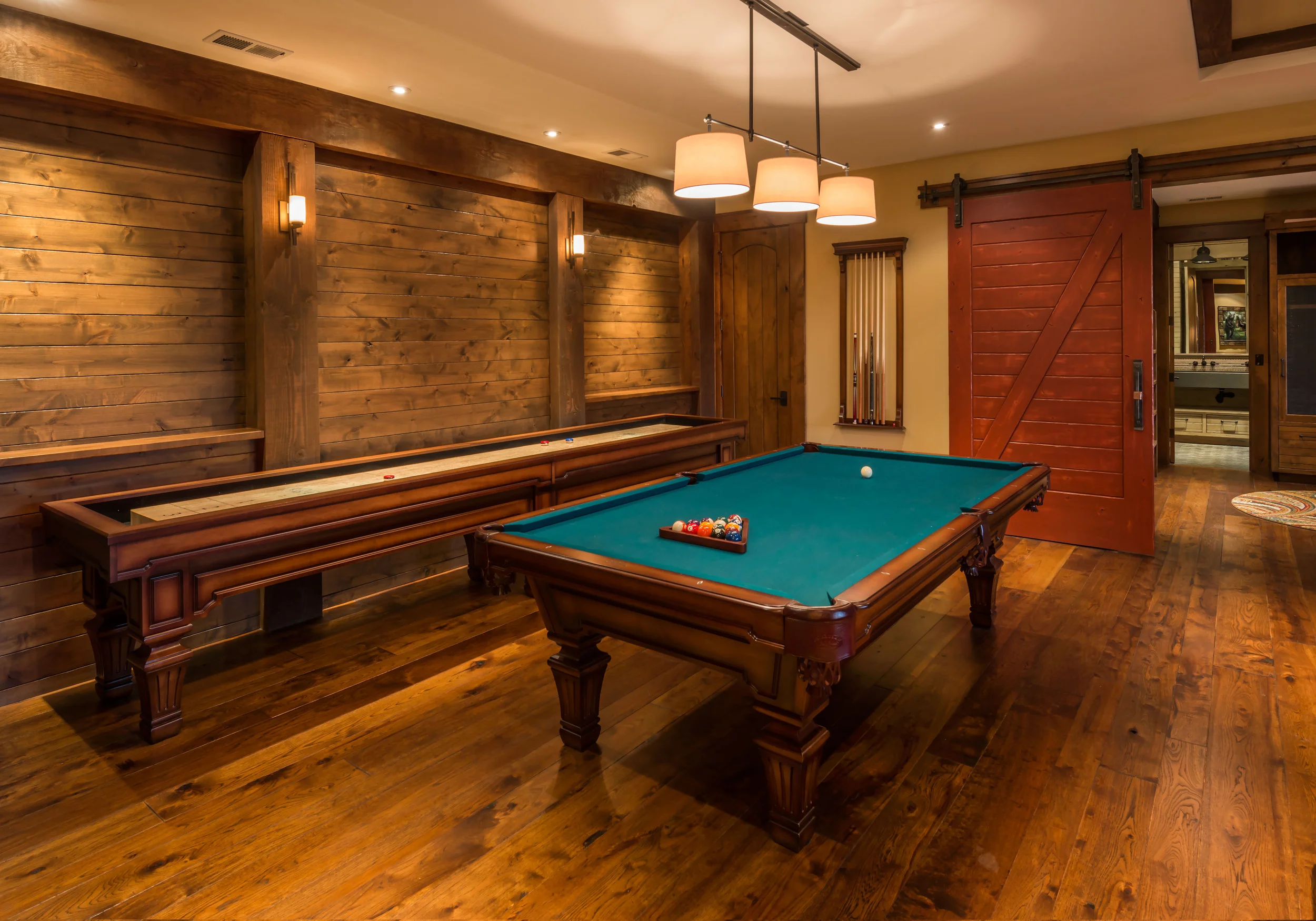 Contractor: Jim Morrison Construction Interior Finishes: WaltonAE Photography: Vance Fox Square Footage: 6,635 sf Features: Covered Outdoor Dining, Game Room, Built-In-Bar, Wine Cellar, Outdoor Shower bedrooms: 5 bathrooms: 5.5