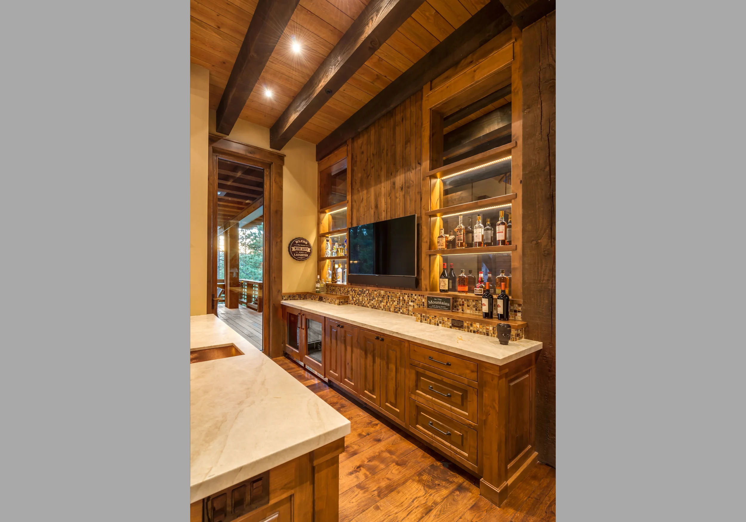 Contractor: Jim Morrison Construction Interior Finishes: WaltonAE Photography: Vance Fox Square Footage: 6,635 sf Features: Covered Outdoor Dining, Game Room, Built-In-Bar, Wine Cellar, Outdoor Shower bedrooms: 5 bathrooms: 5.5