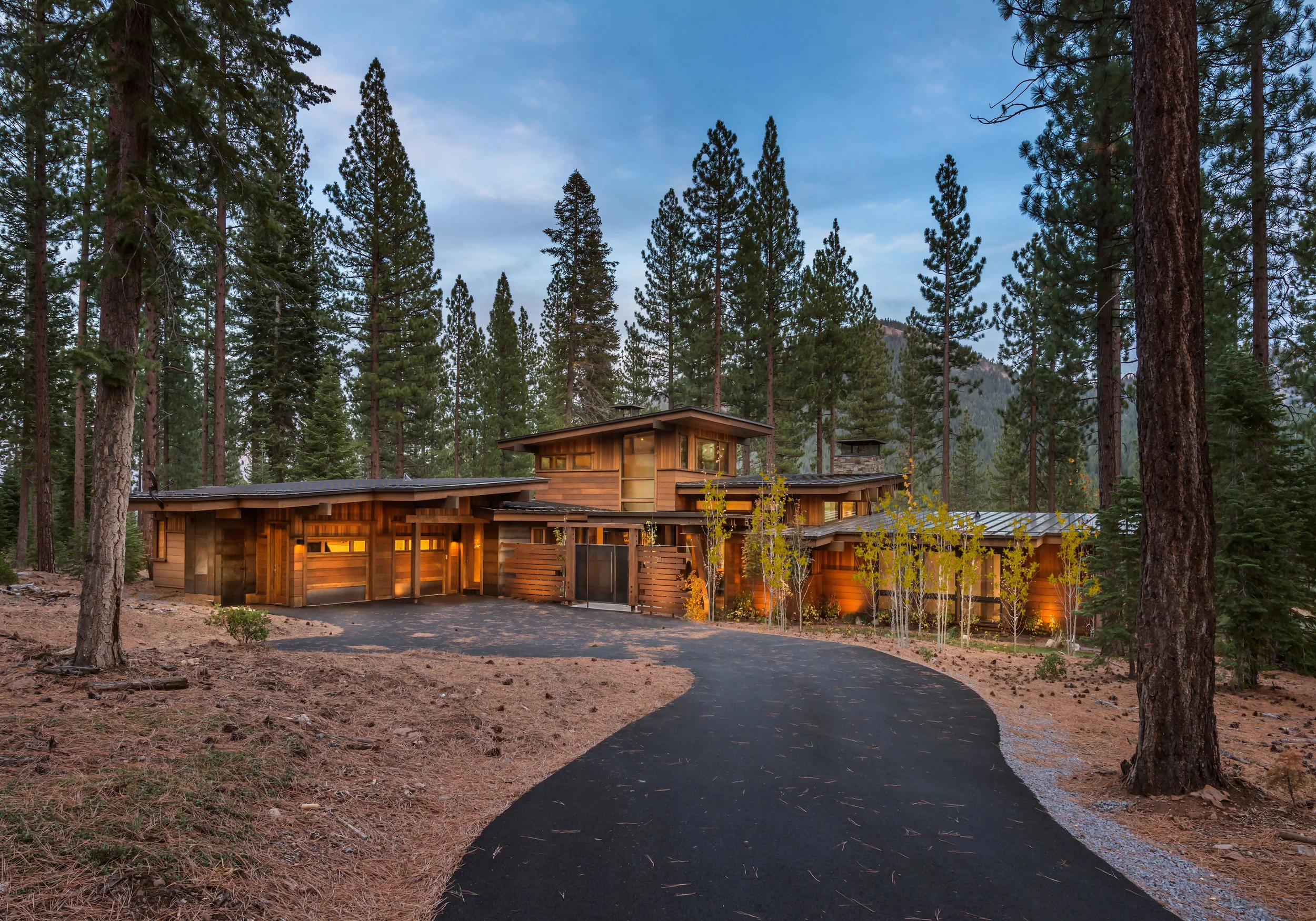 Contractor: Loverde Builders Interior Finishes: WaltonAE Photography: Vance Fox Square Footage: 3,226 sf Features: Water Feature + Bridged Link to Garage, Firepit Terrace, Collapsible Window Wall at Living Room bedrooms: 3 bathrooms: 3.5
