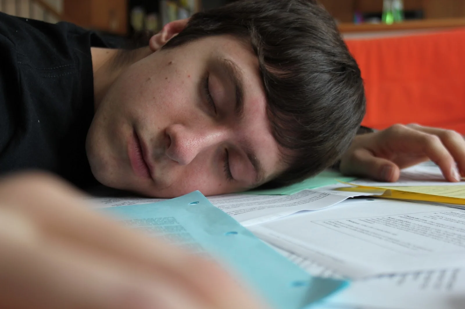 This is a photo I took for a school assignment using a rack focus. The hand is blurry while the face is clear.