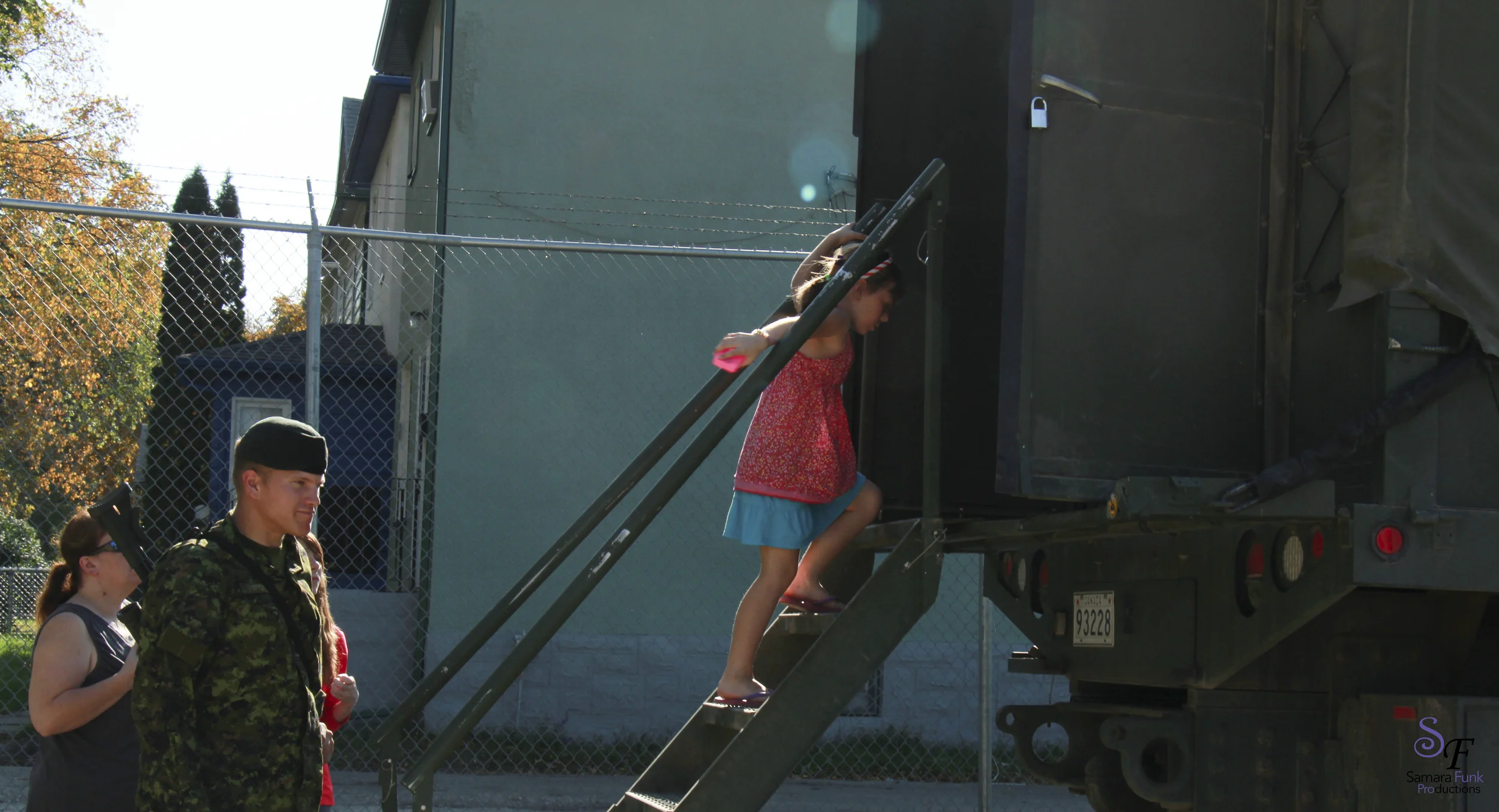 Girl walking up truck.jpg