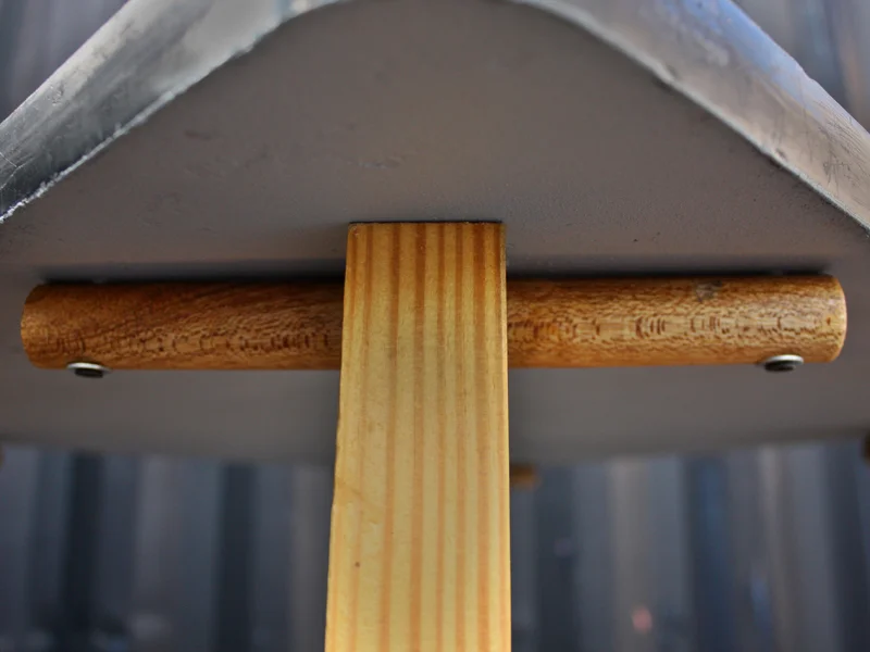 Dowel "ears" secure the leg to the table with screws and provide lateral stability. 