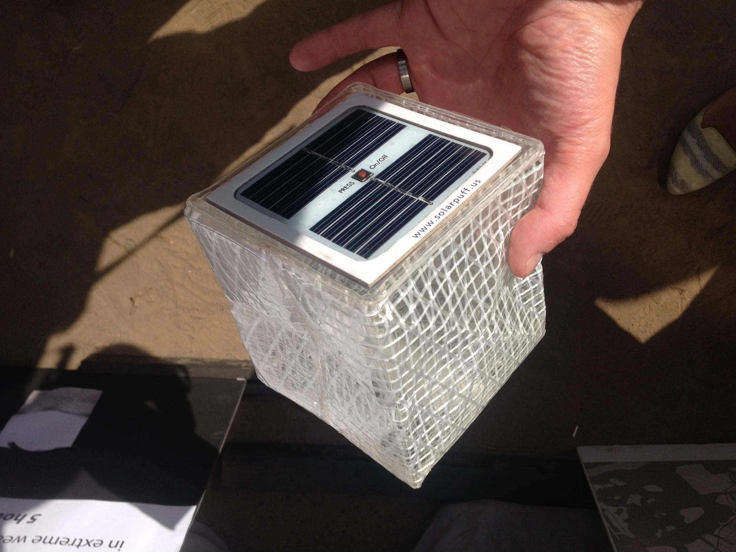 Beautiful solar-powered, flat-pack, LED lamp made from sailcloth by Solar Puff . 