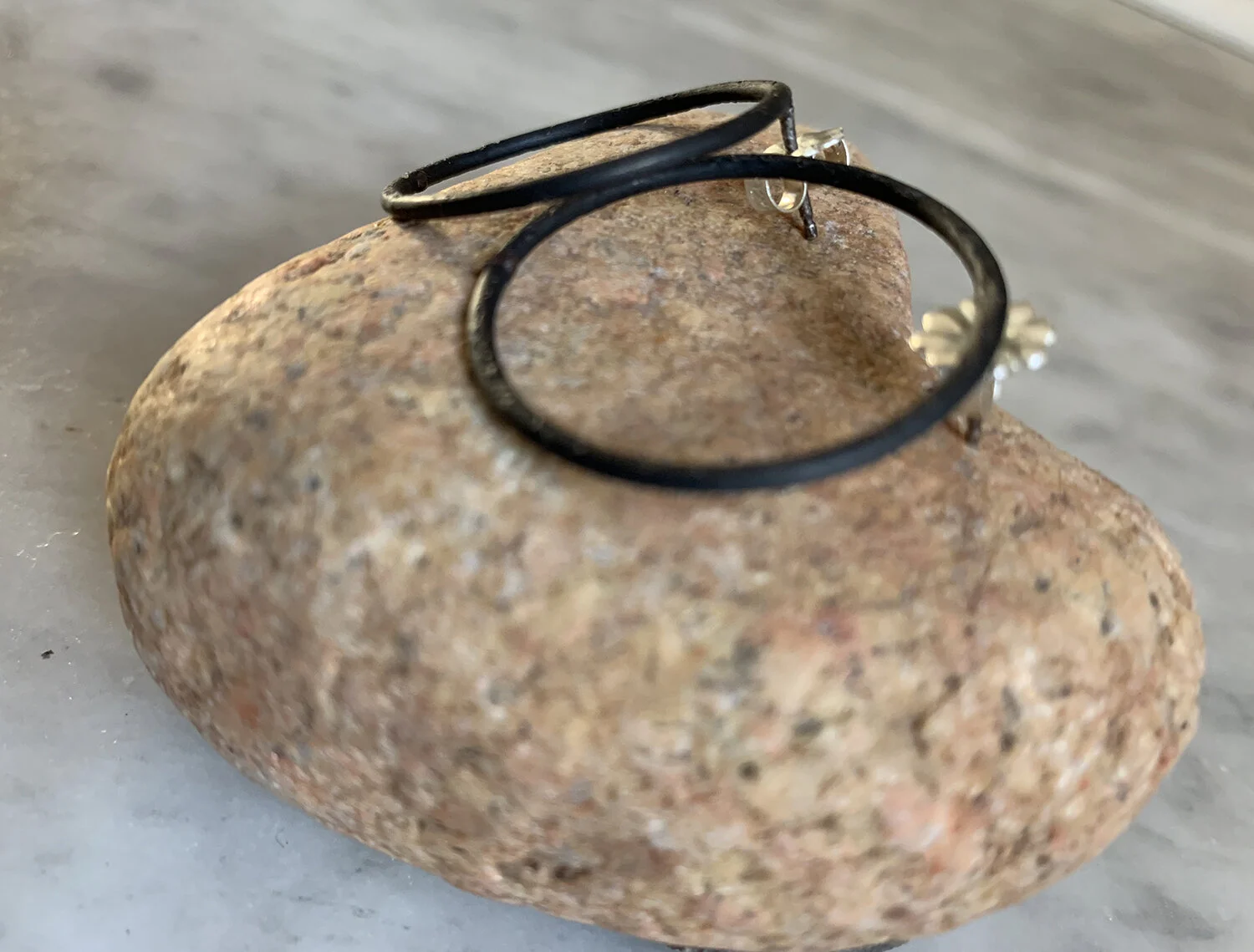 Mild steel earrings with sterling silver posts.