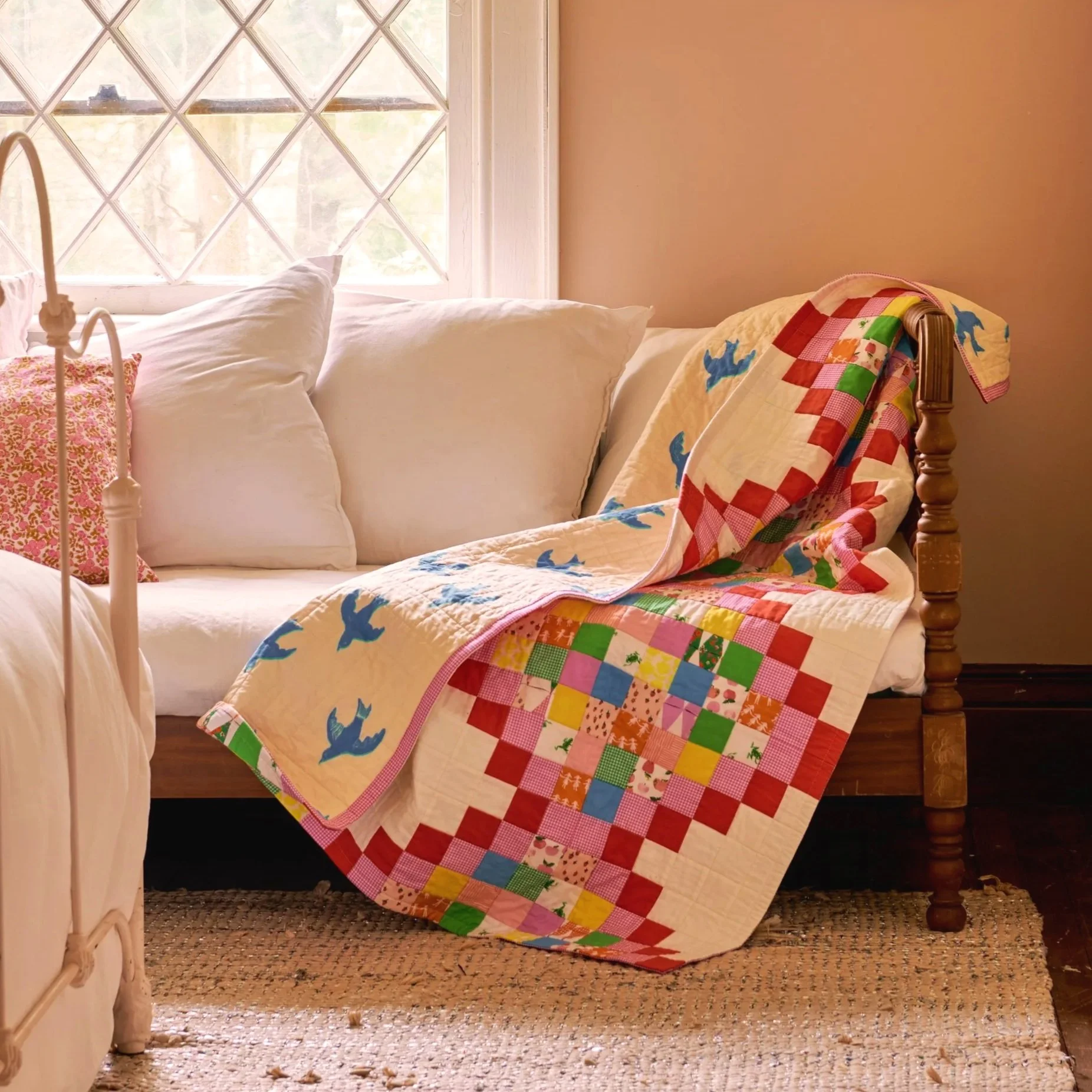 postagestampquilt-onbed.jpg