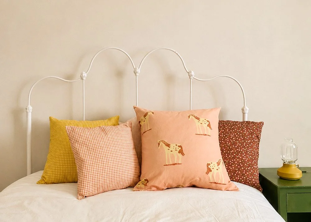 PINK PONIES-PILLOW-ON BED.jpg