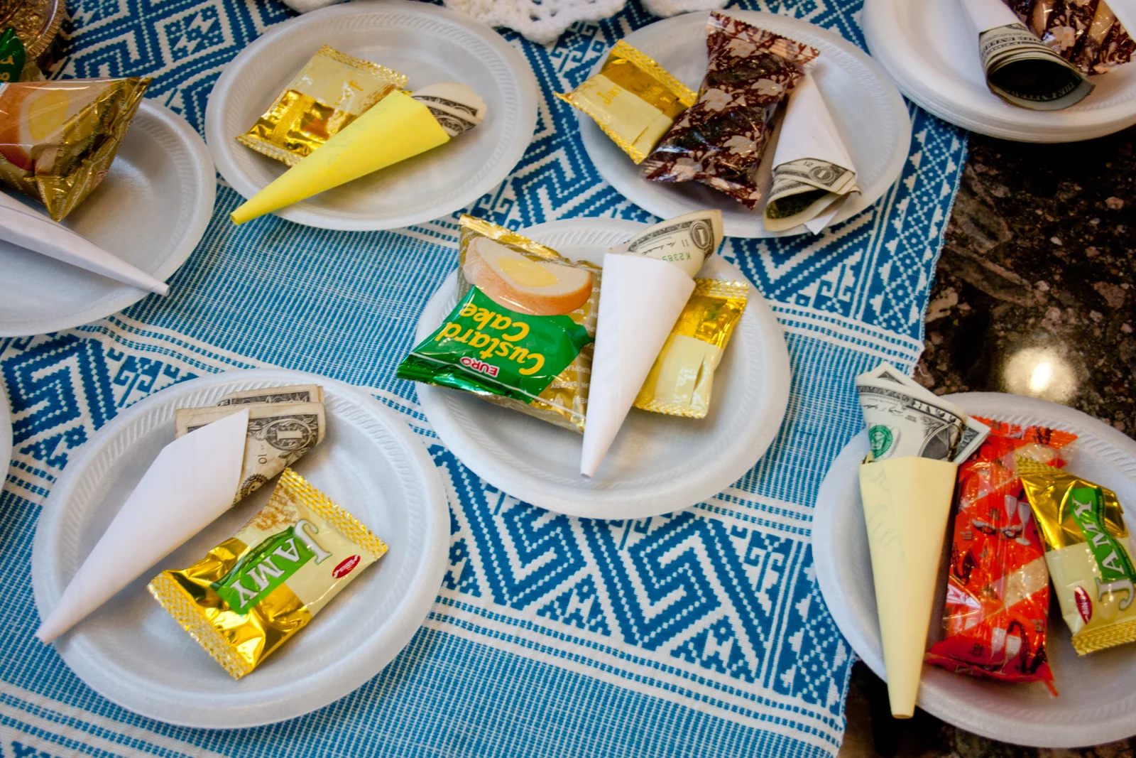 Offerings prepped for our visiting Buddhist monk, Say Mathmanivong from Kings Mountain, NC. (Notebook paper is an easy replacement for banana leaves.)