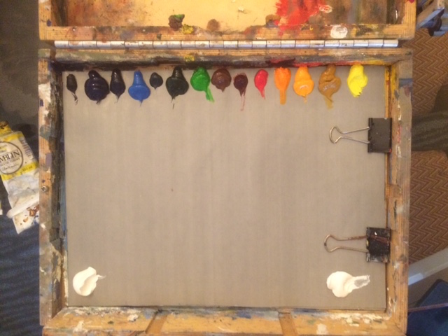 I lay my palette out the same overtime for efficiency. From left to right, cool to warm, including two separate pots of white (one for cool and one for warm mixing).