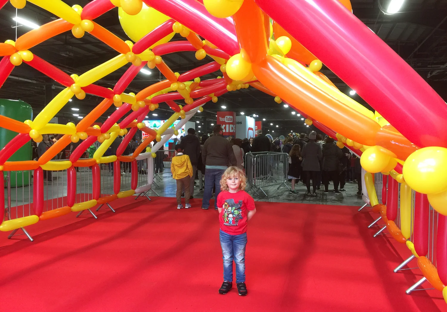 Jacob on the red carpet at the entrance to the Digital Kids Show
