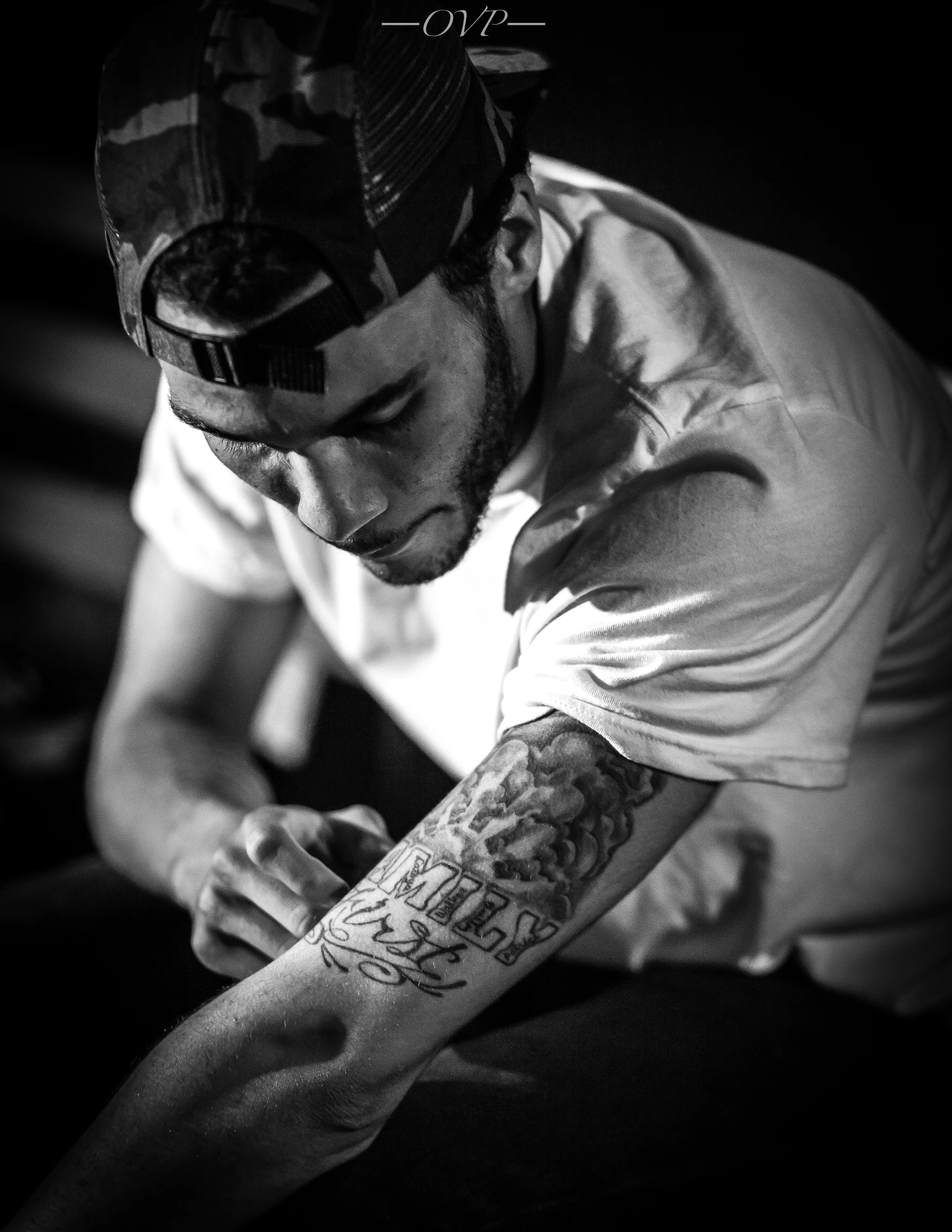 OVP: What does that tattoo mean to you? MT: This one is one of my first tattoos I got. It says family first, inside of the word family has the names of my family members. If you look at it closely you wouldn't see my fathers name because he hasn't really been in my life.