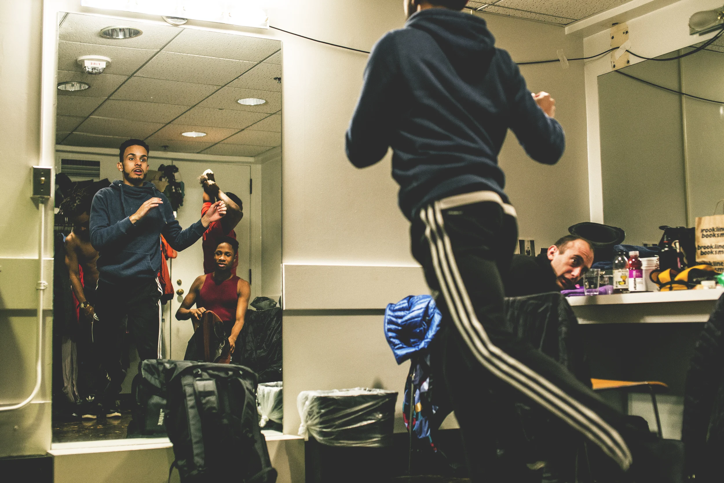 Dancers practice backstage before the big show.