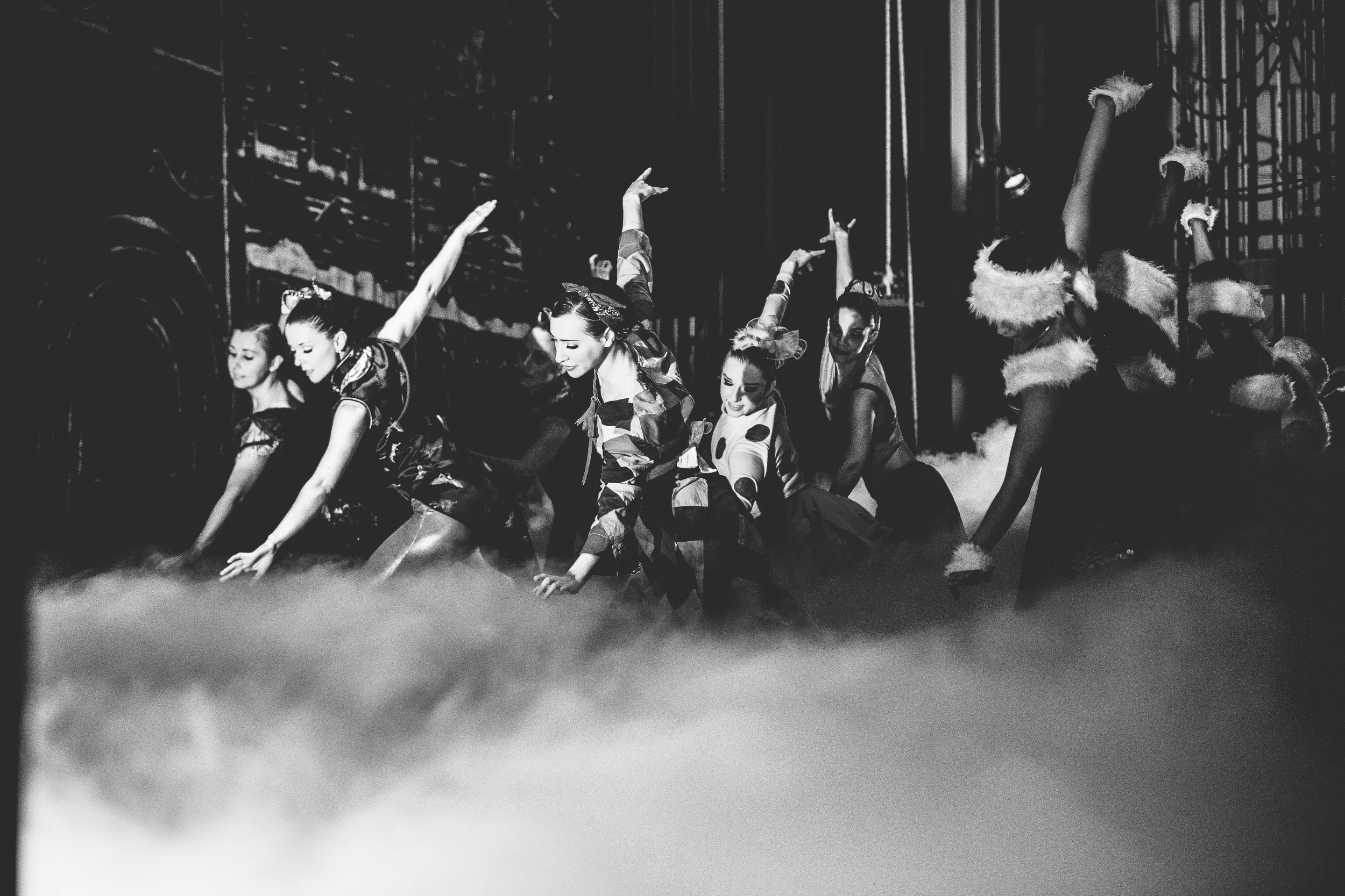 Fog bellows from the fog machines right before the curtains rise.