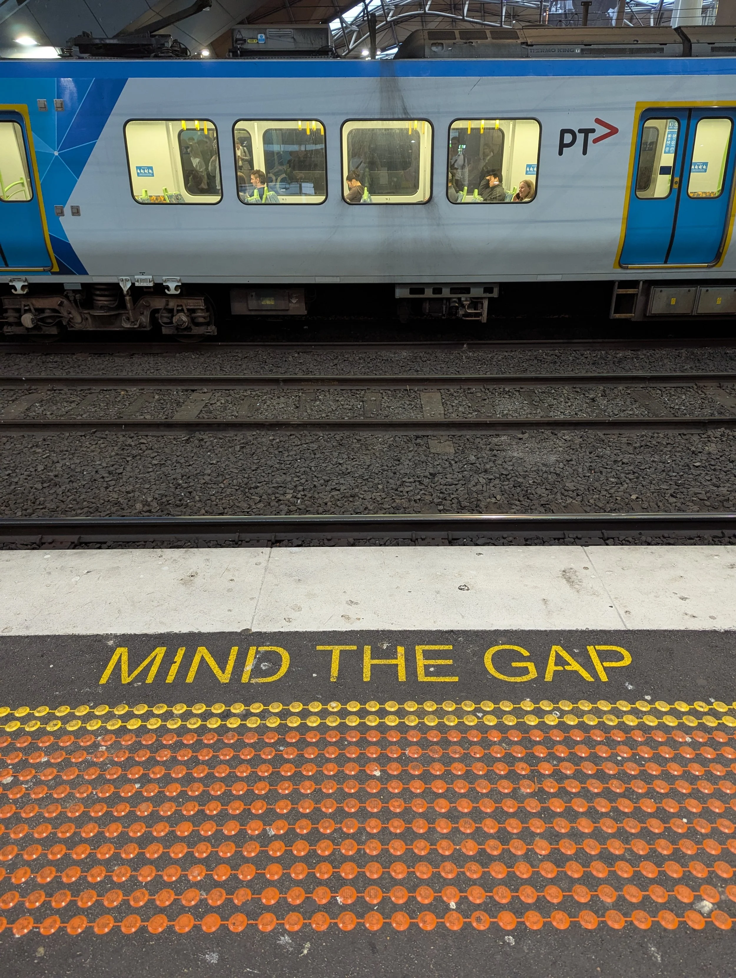 Stand behind the yellow line